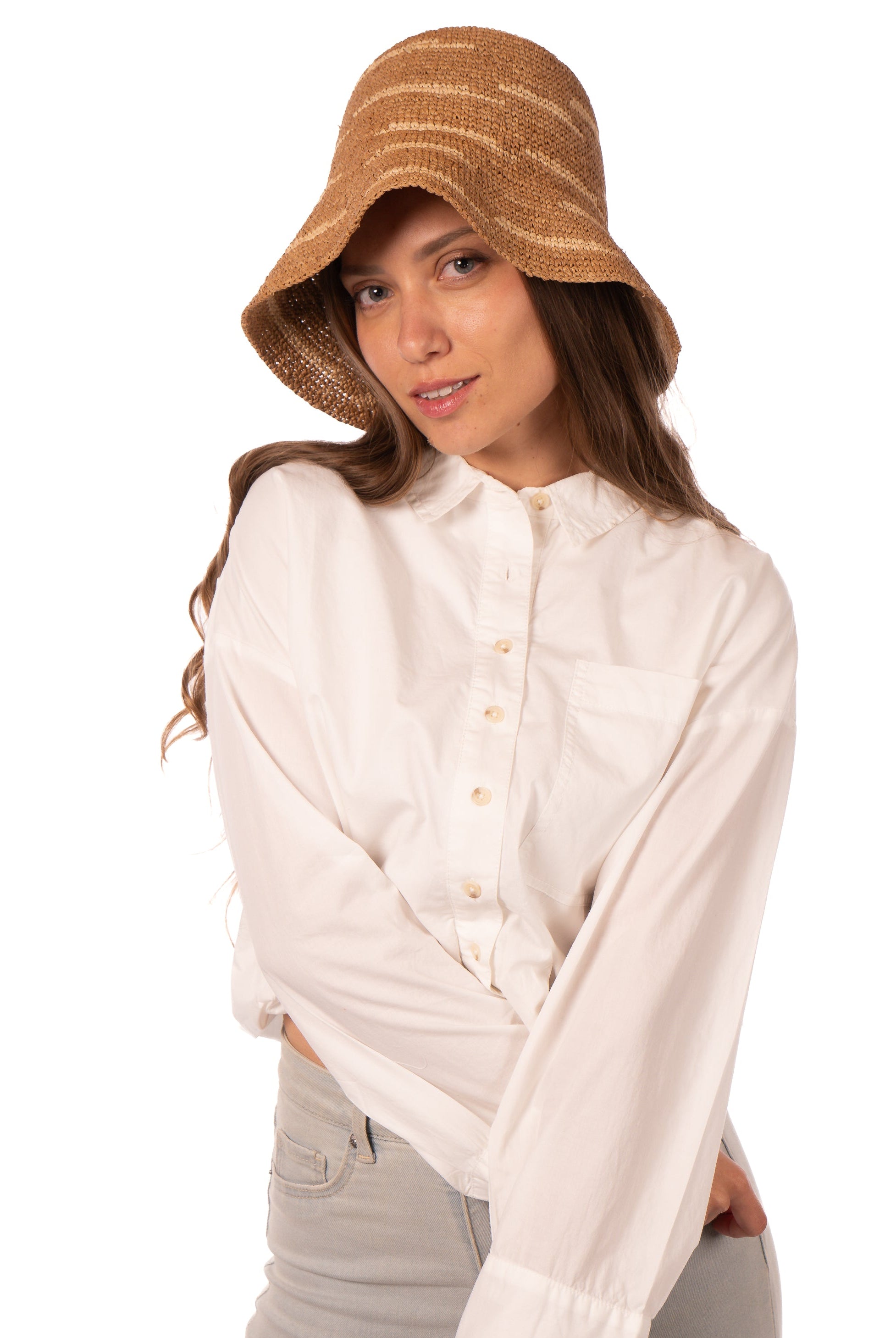 Model wearing 2.5" Brim Taylor Cappuccino Crochet Bucket Straw Hat with Zebra Stripes handmade raffia palm fiber in a two tone color combination of horizontal short stripes that create a dash pattern around the hat in cappuccino light brown with natural straw color - Shebobo