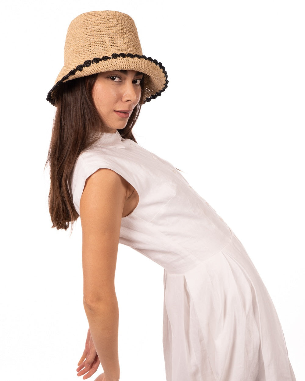 Model wearing Kate Natural with Black Crochet Bucket Straw Hats with Colored Lace Weave Edge handmade woven raffia palm fiber in a solid hue of natural straw color in a subtle link texture with black lace weave floral edge trim around the outer brim two tone multicolor uv protection hat - Shebobo