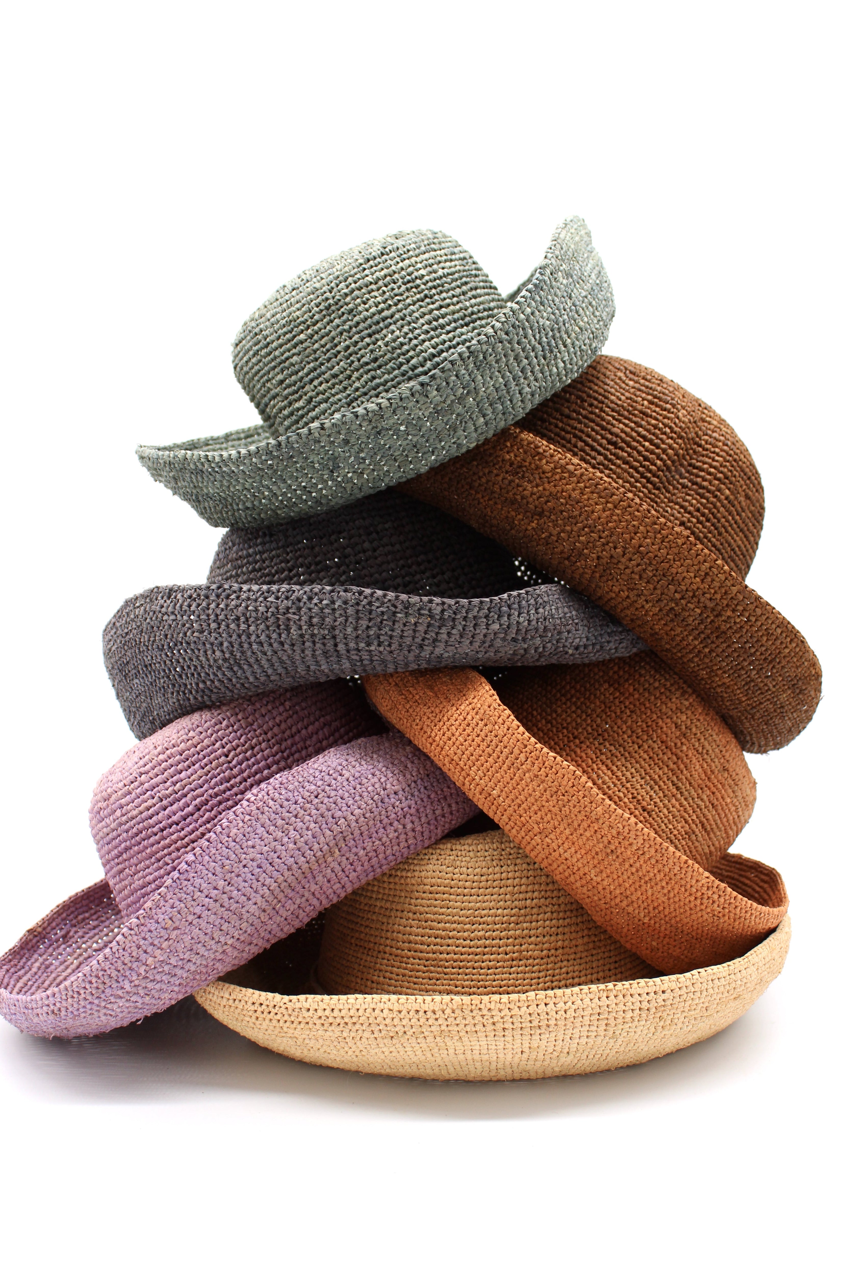 Multiple Color Options 3" Brim Leor Crochet Straw Sun Hats top to bottom Ocean Mist Green, Cinnamon/Tobacco/Brown, Grey, Blush Pink/Orange, Wisteria Purple, and Natural straw color handmade woven crochet natural raffia palm fiber sun hats - Shebobo