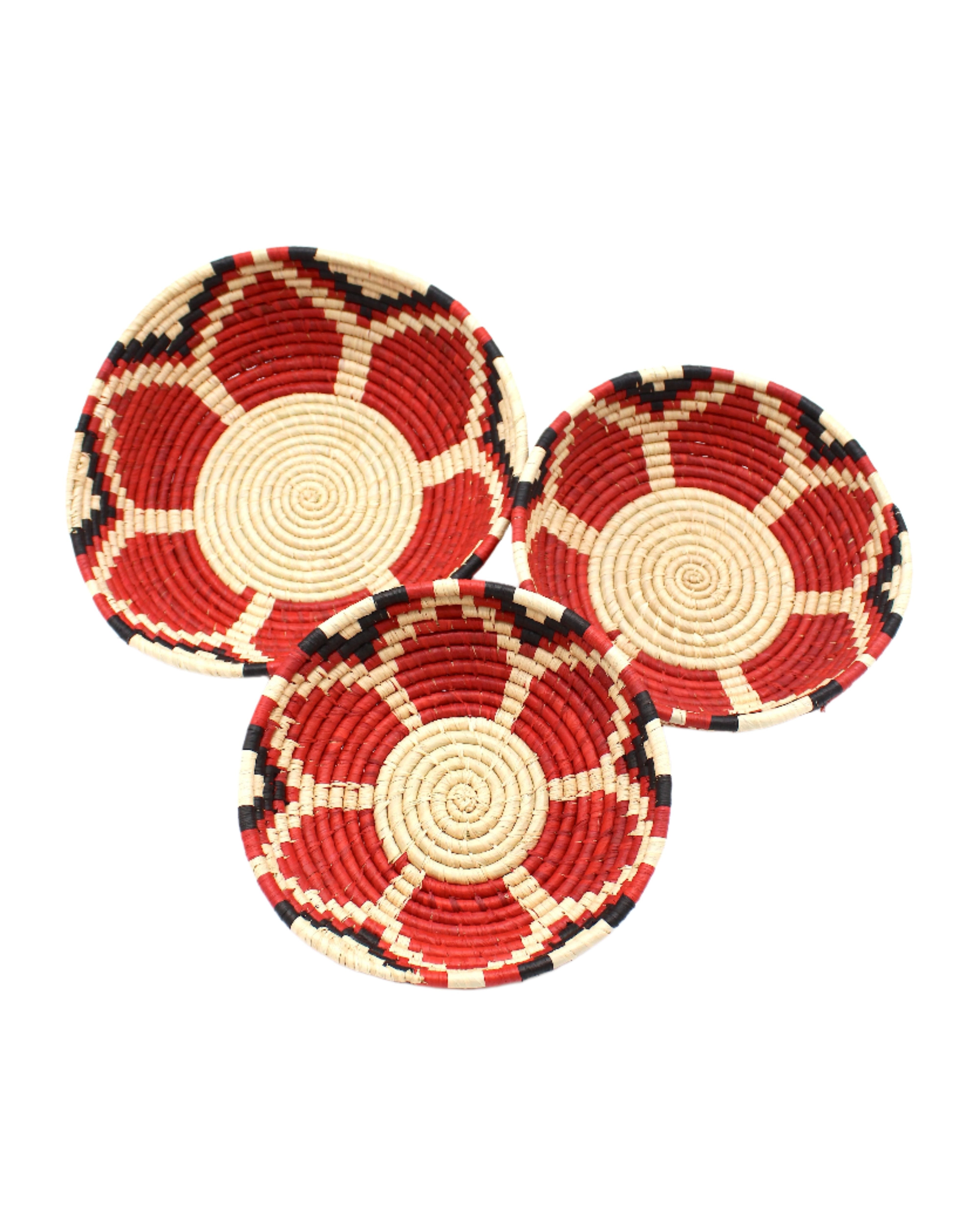 Amara Raffia Straw Decor Display Basket Bowls: Set of 3 handmade woven natural raffia palm fiber in a crochet loop technique concentric coiled circular pattern with natural straw color centered in the bottom with red, natural, and black geometric floral design pattern up the sides of the bowls set of small, medium, and large straw display bowls - Shebobo