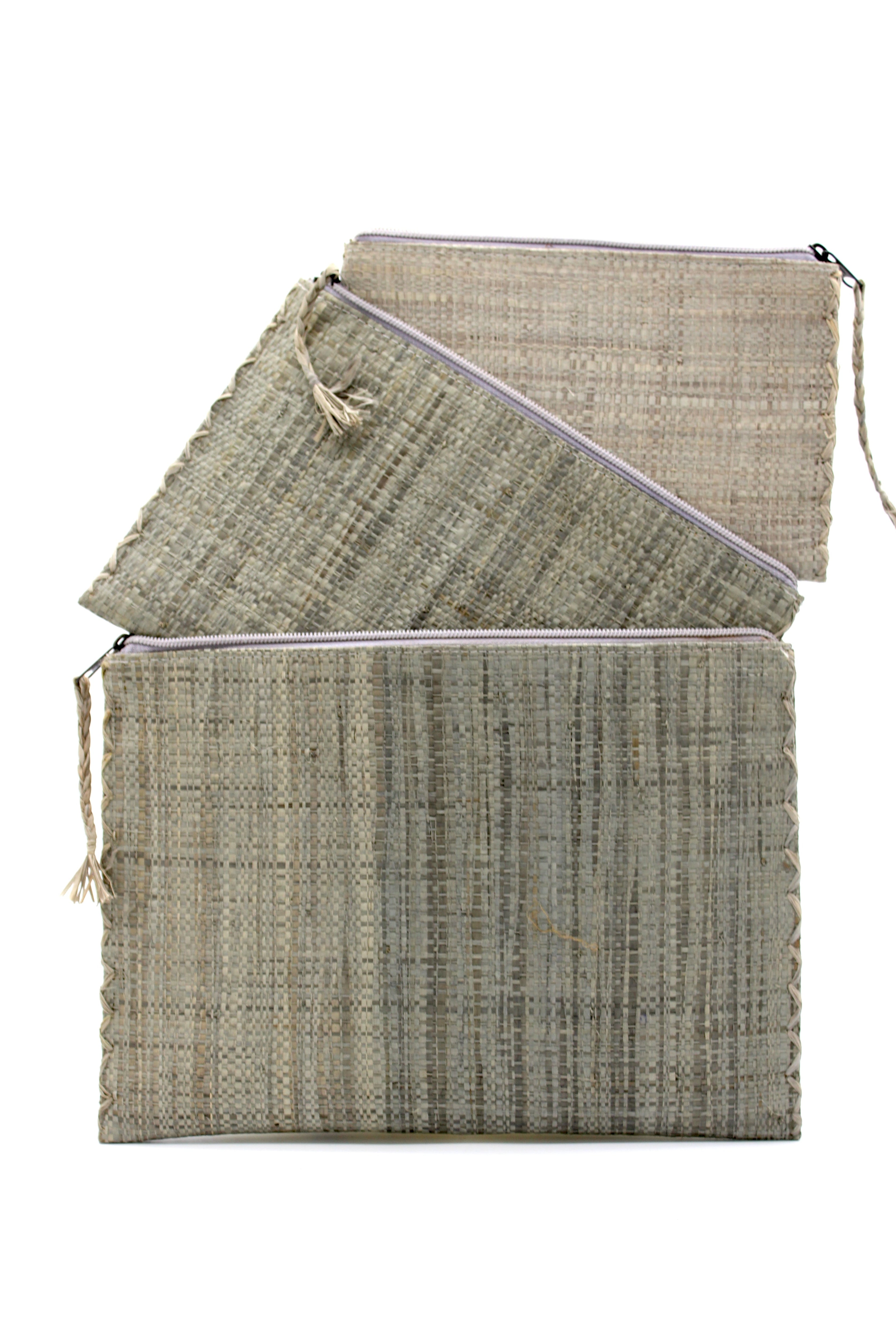 Amelia Set of 3 Grey Nesting Zippered Straw Clutches Solid Colors handmade loomed raffia in a solid hue with matching zipper and braided zipper pull with cross stitch edging in three sizes of small, medium, and large - Shebobo