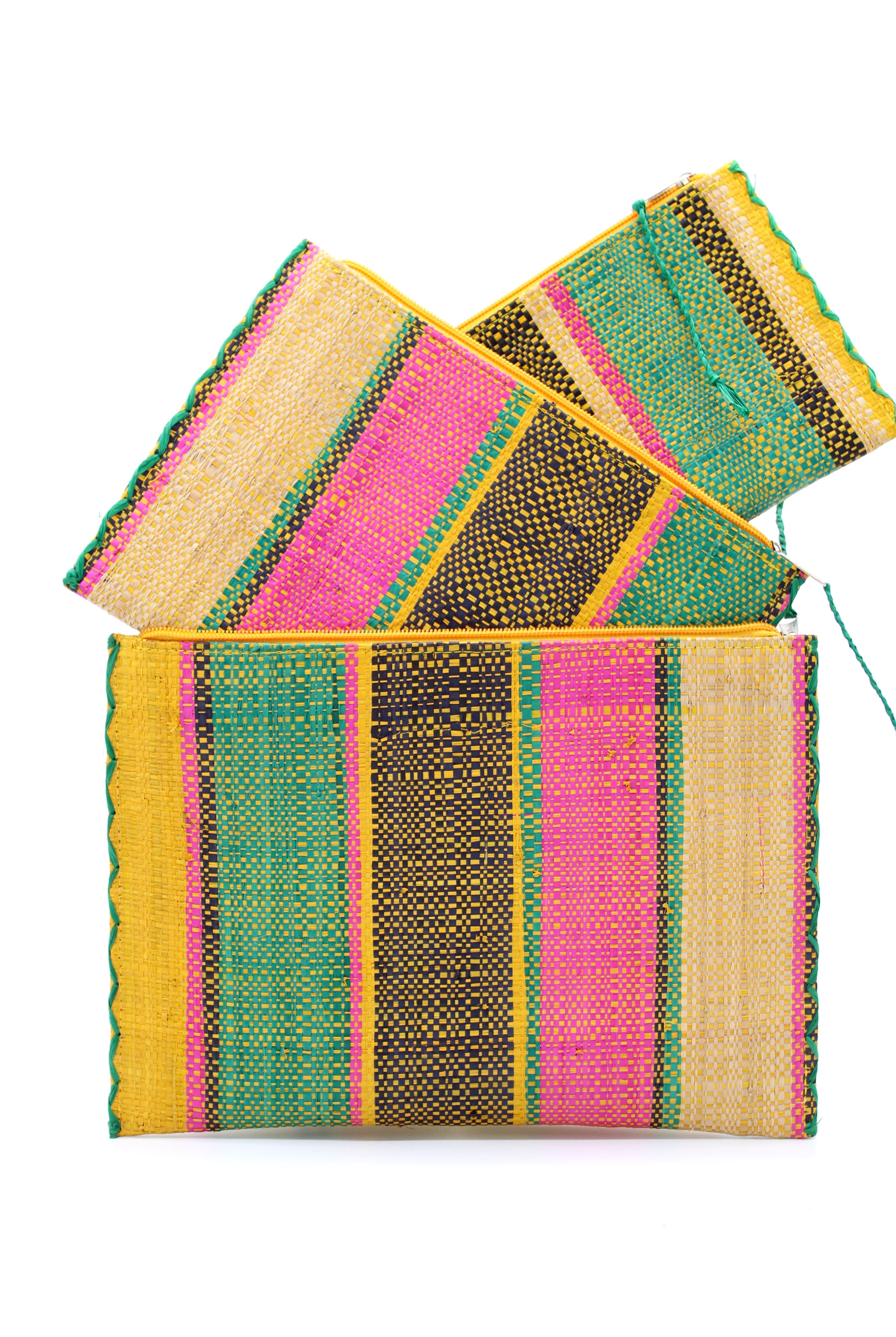 Amelia Set of 3 Nesting Zippered Straw Clutches Carmalita Multicolor Stripe Pattern handmade loomed raffia in multiple widths of vertical stripes in turquoise, black, fuchsia, and saffron with matching zipper and braided zipper pull with cross stitch edging in three sizes of small, medium, and large - Shebobo