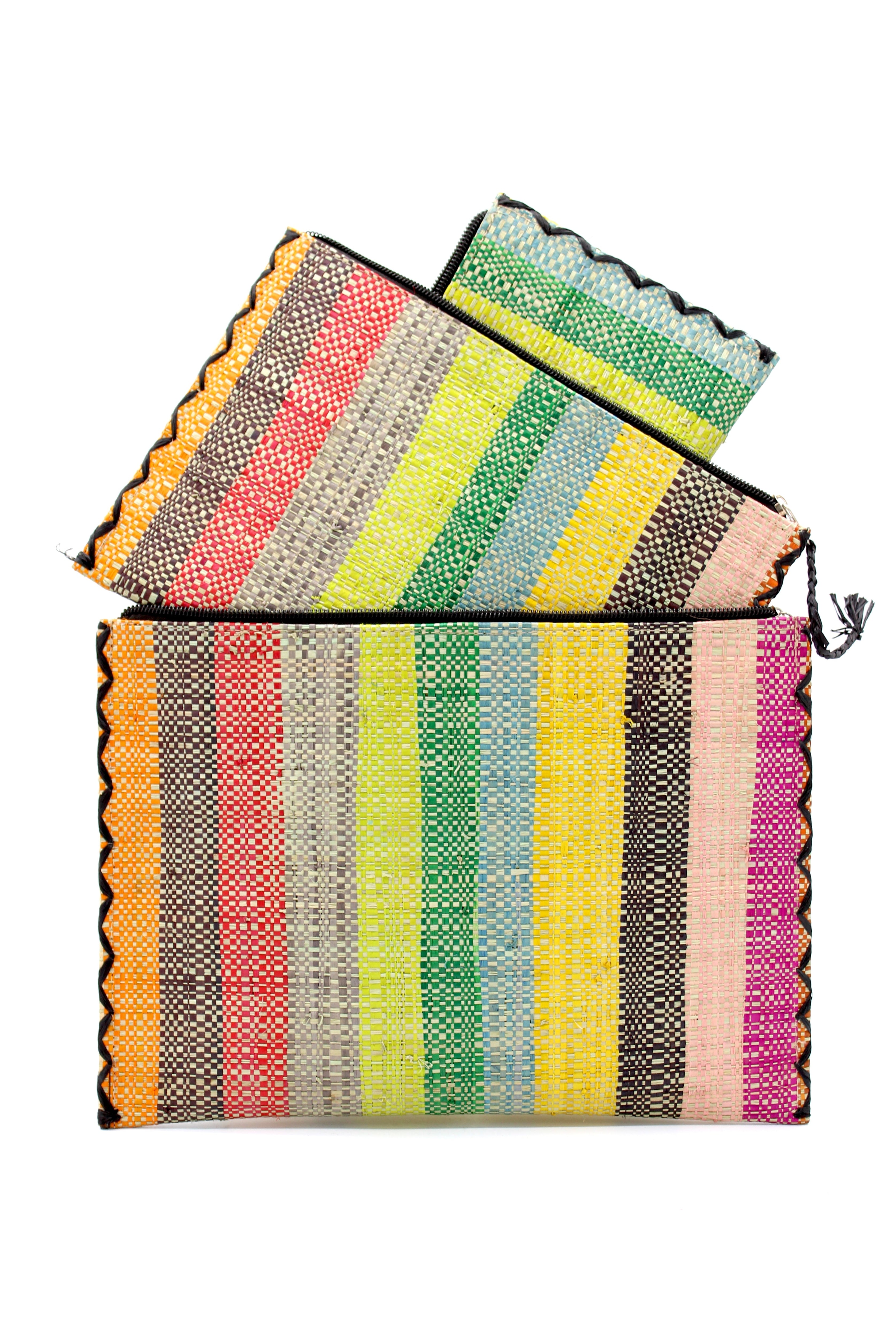 Amelia Set of 3 Nesting Zippered Straw Clutches Lollipop Multicolor Stripe Pattern handmade loomed raffia in multiple widths of vertical stripes in natural, orange, green, saffron, light blue, red, fuchsia, pink, black, grey, etc. with matching black zipper and braided zipper pull with cross stitch edging in three sizes of small, medium, and large - Shebobo