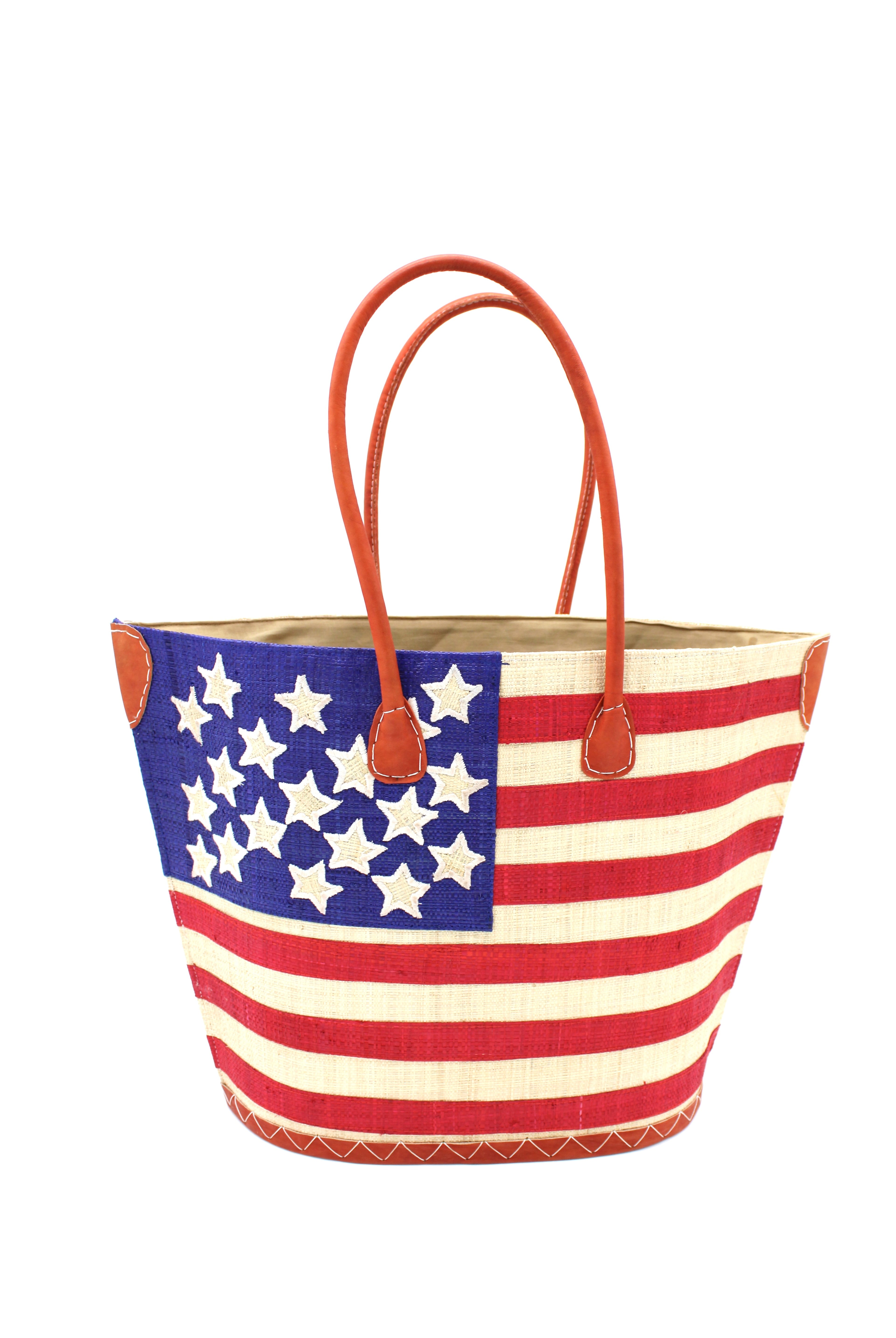 American Flag Straw Tote Bag handmade loomed raffia palm fiber in a multicolor dusk navy/dark/blue, red, and natural straw color patriotic American Flag pattern across the front of the bag with matching stitching and leather handles shoulder bag beach bag tote handbag - Shebobo