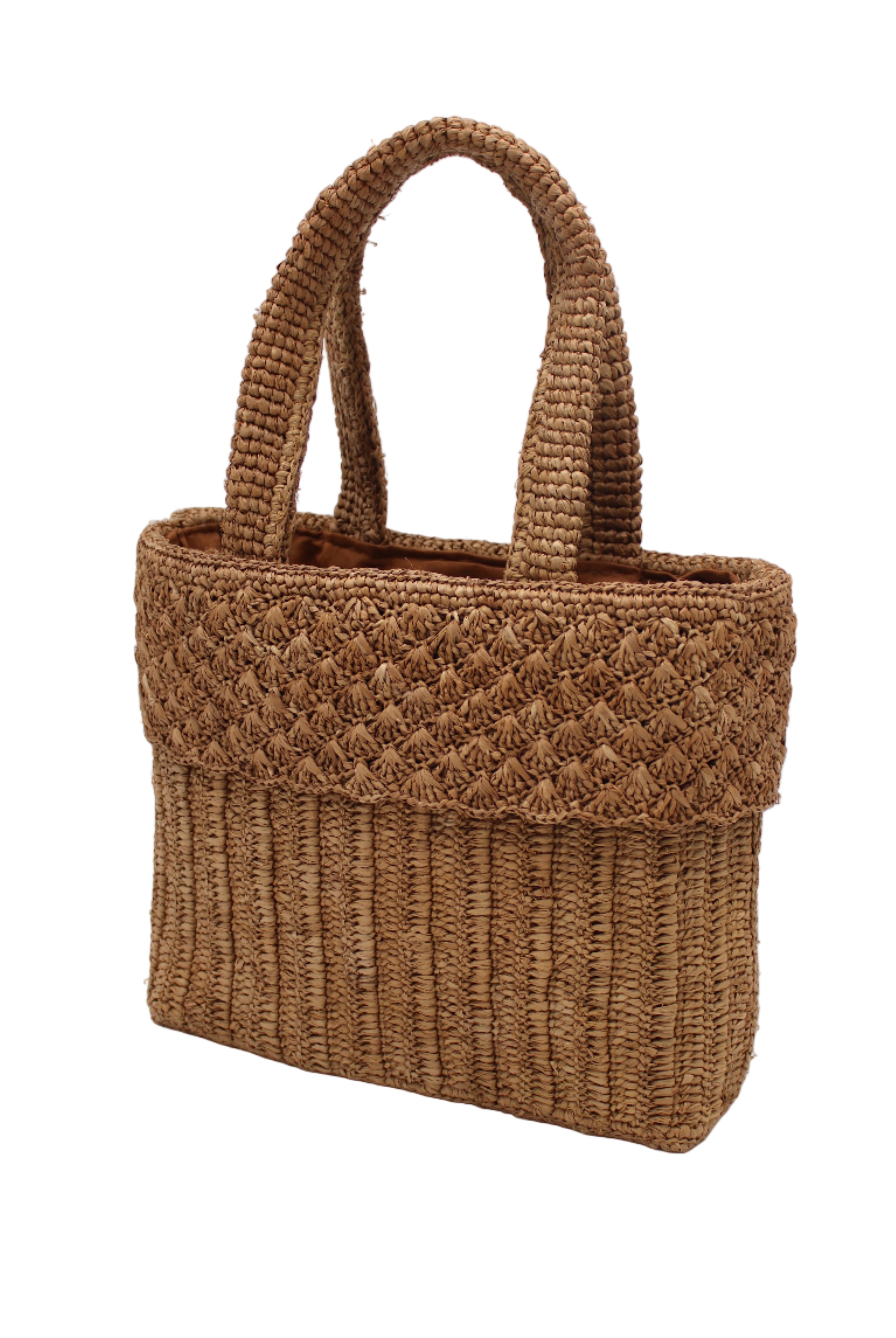 Side view Anna Petal Pattern Crochet Straw Basket Handbag handmade natural raffia palm fiber in a solid hue of Cappuccino tea/light/brown crochet in multiple textures resulting in a subtle pattern of vertical linked bands on the bottom 2/3 of the bag, and a floral petal or shell pattern on the upper third with rolled panel of links making up the handles Beach Bag Purse - Shebobo