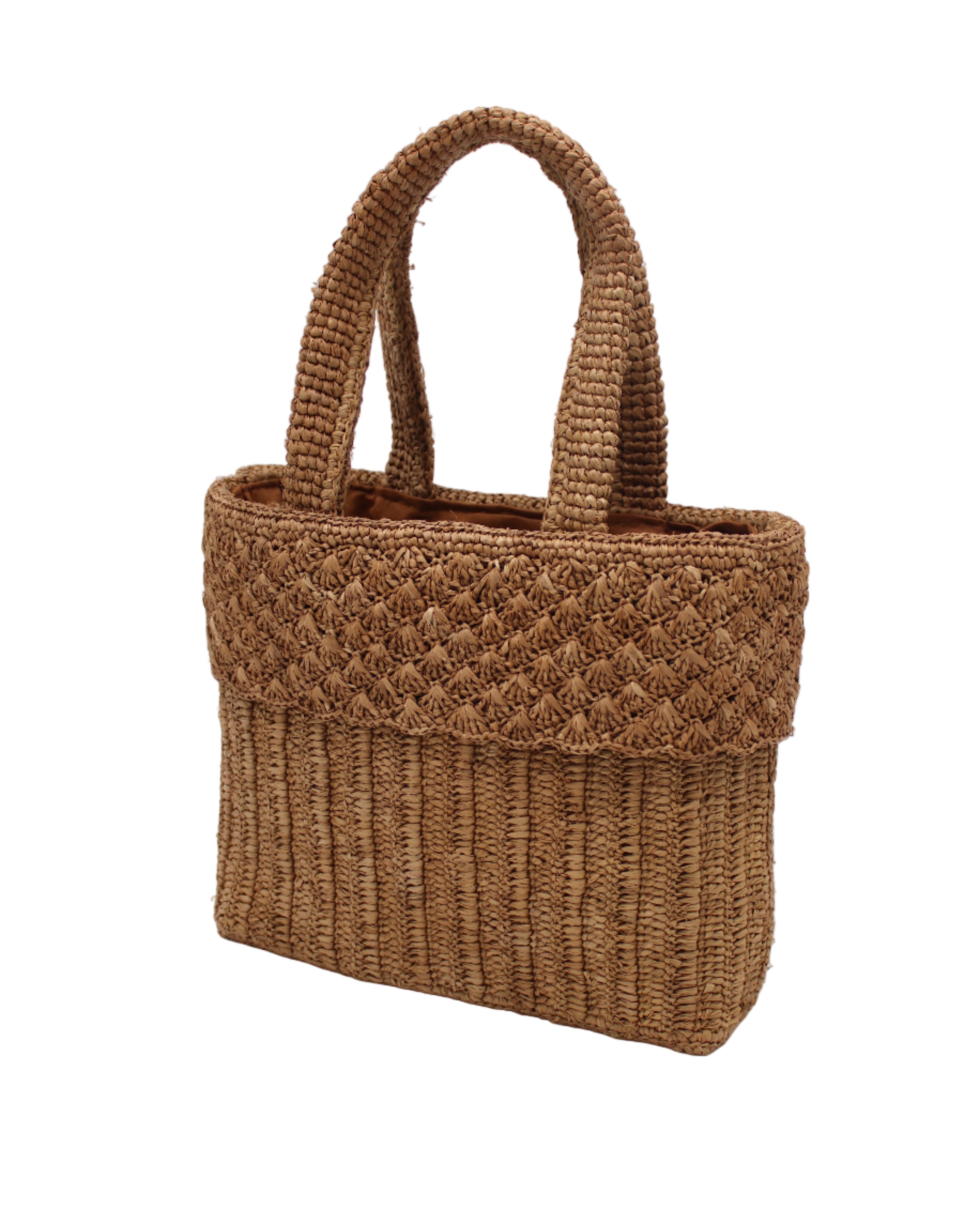 Side view Anna Petal Pattern Crochet Straw Basket Handbag handmade natural raffia palm fiber in a solid hue of Cappuccino tea/light/brown crochet in multiple textures resulting in a subtle pattern of vertical linked bands on the bottom 2/3 of the bag, and a floral petal or shell pattern on the upper third with rolled panel of links making up the handles Beach Bag Purse - Shebobo
