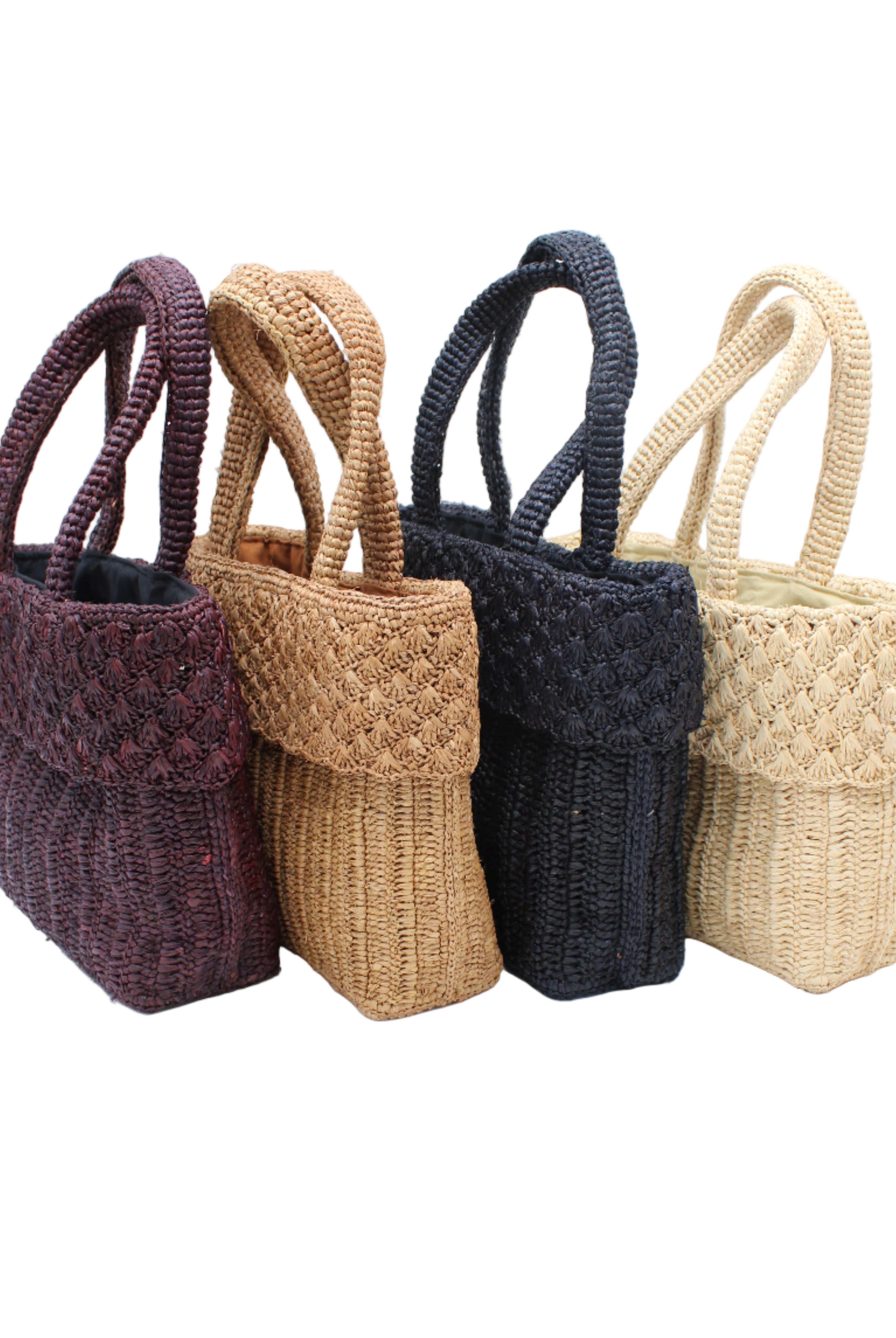 Anna Petal Pattern Crochet Straw Basket Handbag handmade natural raffia palm fiber in a solid hues crochet in multiple textures resulting in a subtle pattern of vertical linked bands on the bottom 2/3 of the bag, and a floral petal or shell pattern on the upper third with rolled panel of links making up the handles Beach Bag Purse - Shebobo
