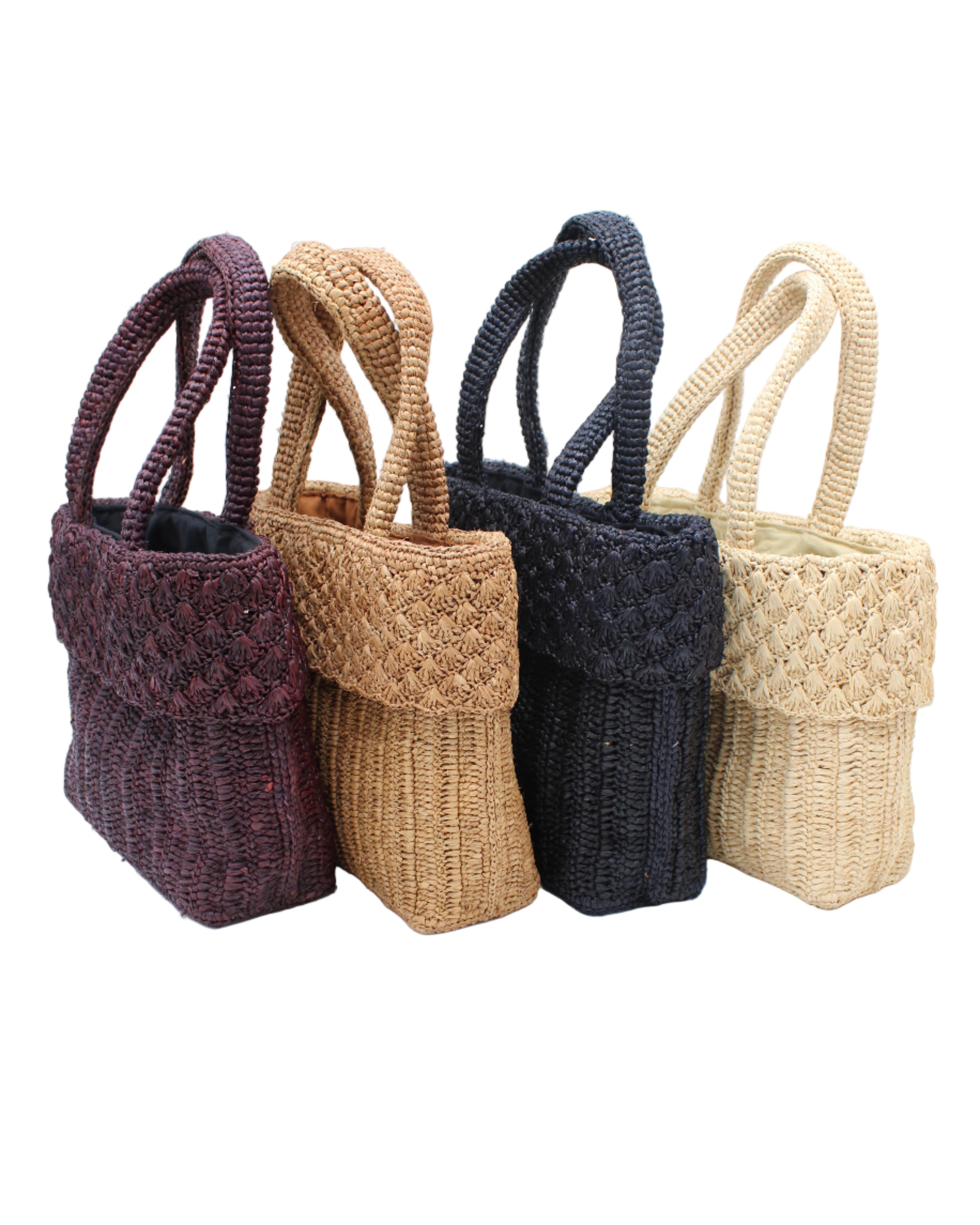 Anna Petal Pattern Crochet Straw Basket Handbag handmade natural raffia palm fiber in a solid hues crochet in multiple textures resulting in a subtle pattern of vertical linked bands on the bottom 2/3 of the bag, and a floral petal or shell pattern on the upper third with rolled panel of links making up the handles Beach Bag Purse - Shebobo