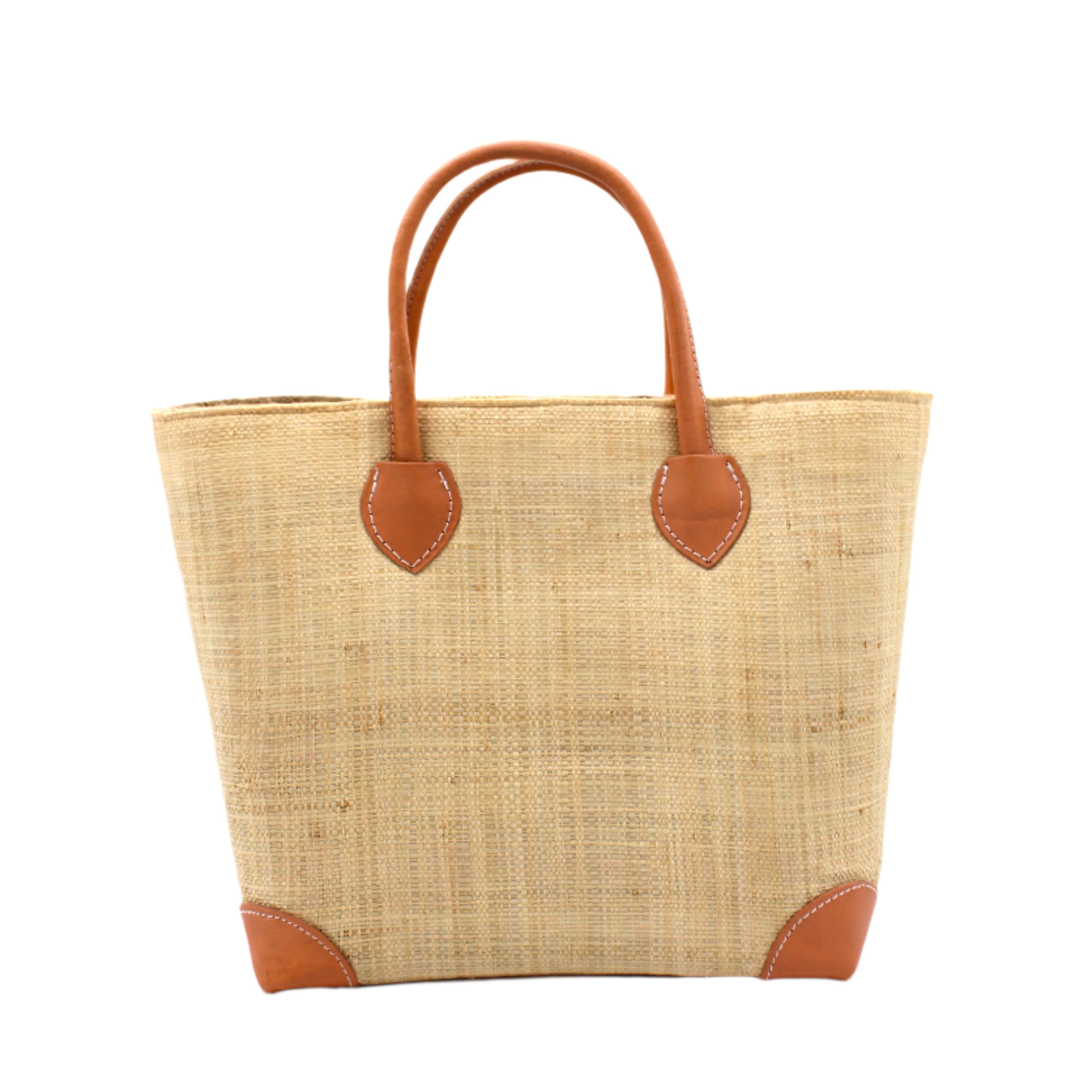Augustine Straw Basket Bag Natural handmade loomed raffia palm fiber in a solid hue of natural straw color handbag purse with leather accents and handles beach bag - Shebobo