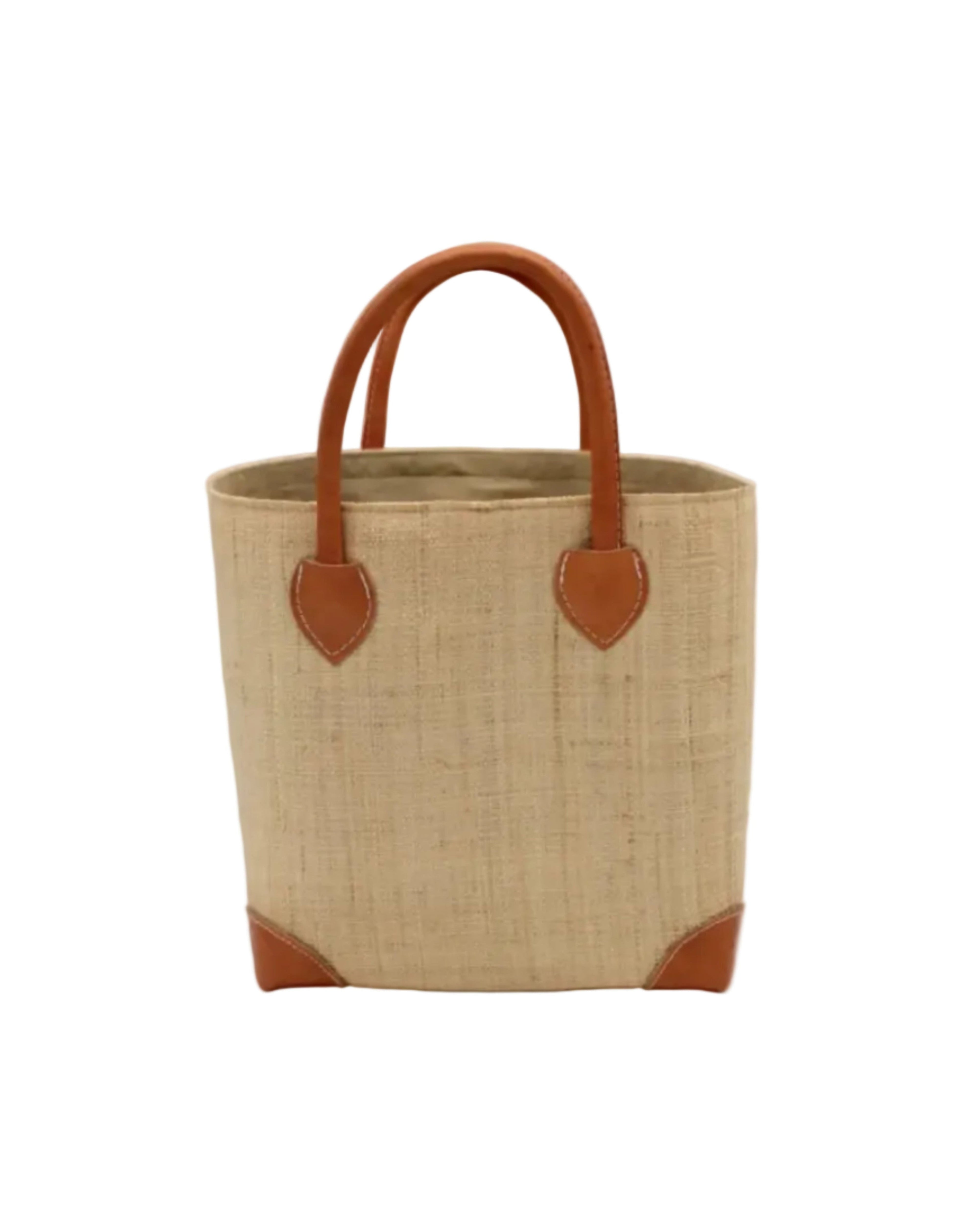 Augustine Straw Basket Bag Natural handmade loomed raffia palm fiber in a solid hue of natural straw color handbag purse with leather accents and handles beach bag - Shebobo