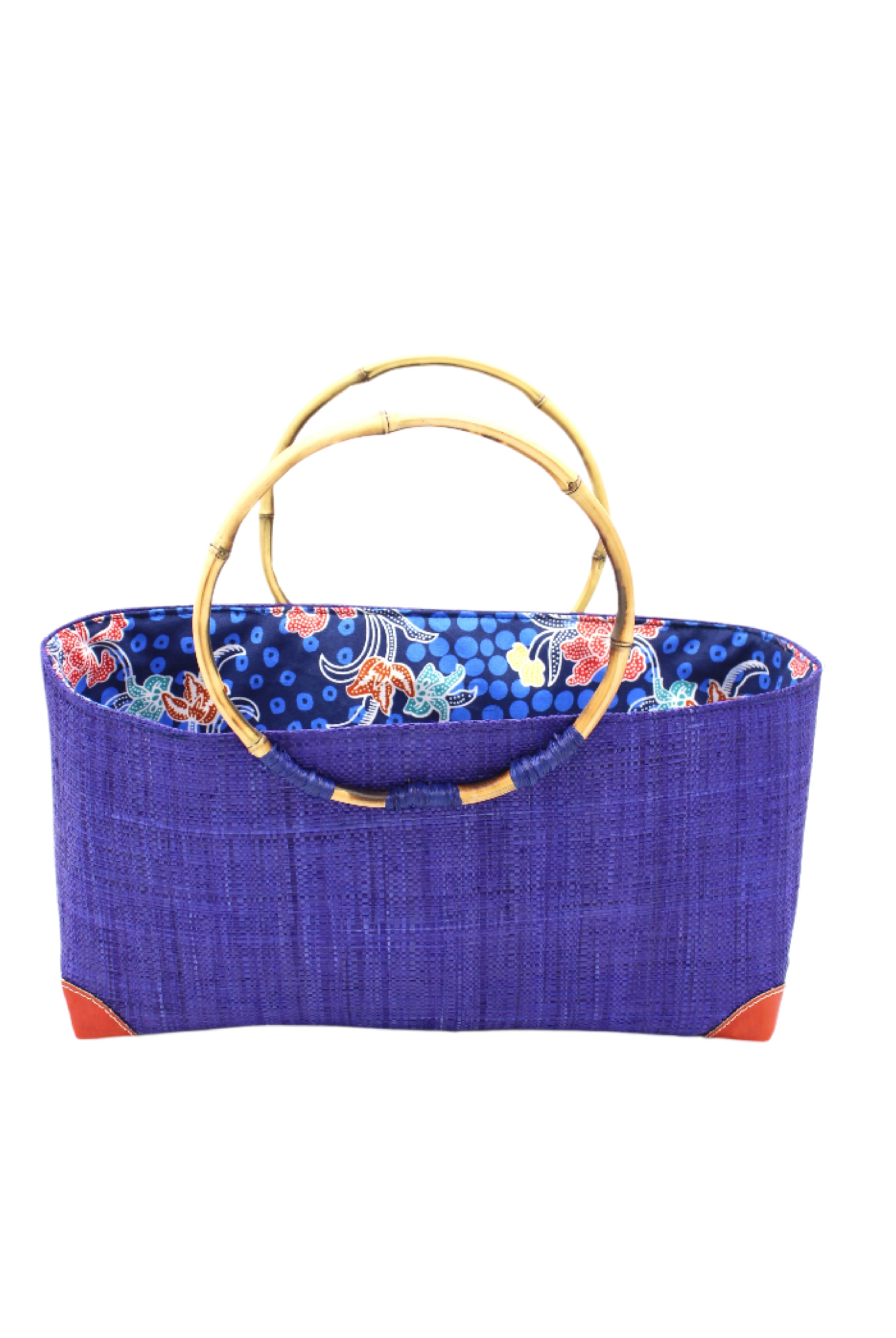 Bebe Straw Handbag with Bamboo Handle handmade loomed natural raffia palm fiber in a solid hue of Dusk dark/navy/blue with molded circular bamboo handles, leather feet, and assorted print African wax-cloth fabric liner - Shebobo