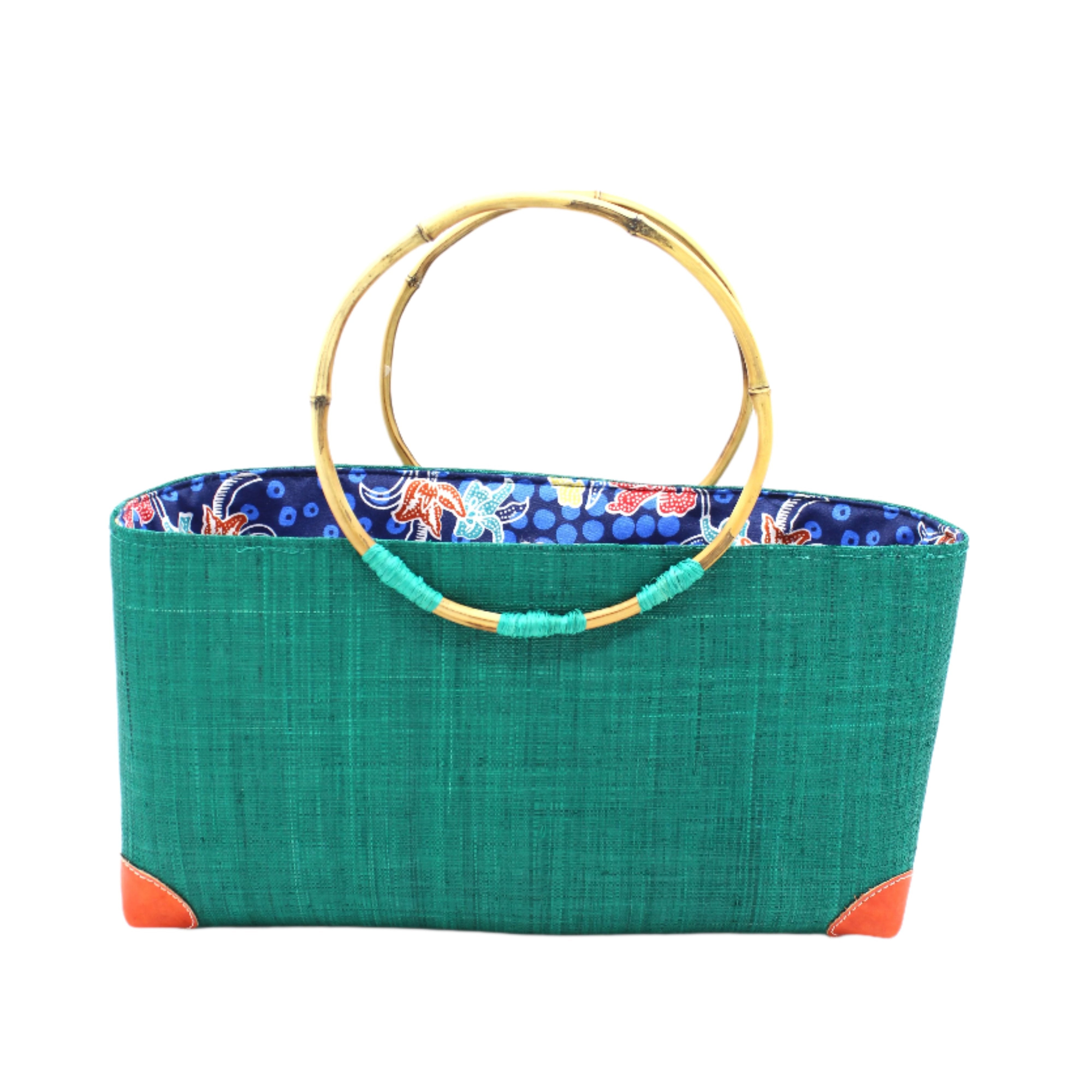 Bebe Straw Handbag with Bamboo Handle handmade loomed natural raffia palm fiber in a solid hue of teal dark/blue/green with molded circular bamboo handles, leather feet, and assorted print African wax-cloth fabric liner - Shebobo