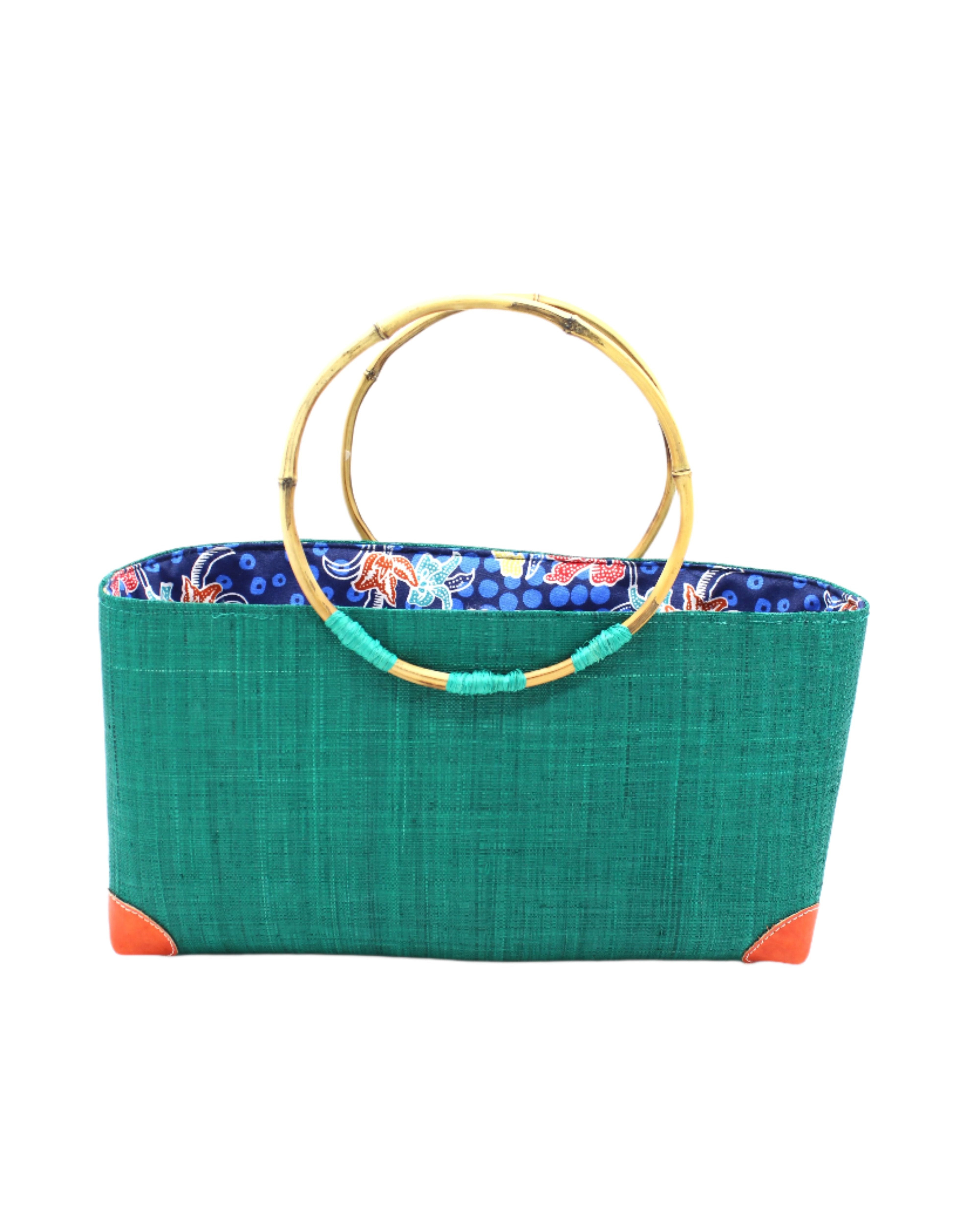 Bebe Straw Handbag with Bamboo Handle handmade loomed natural raffia palm fiber in a solid hue of teal dark/blue/green with molded circular bamboo handles, leather feet, and assorted print African wax-cloth fabric liner - Shebobo