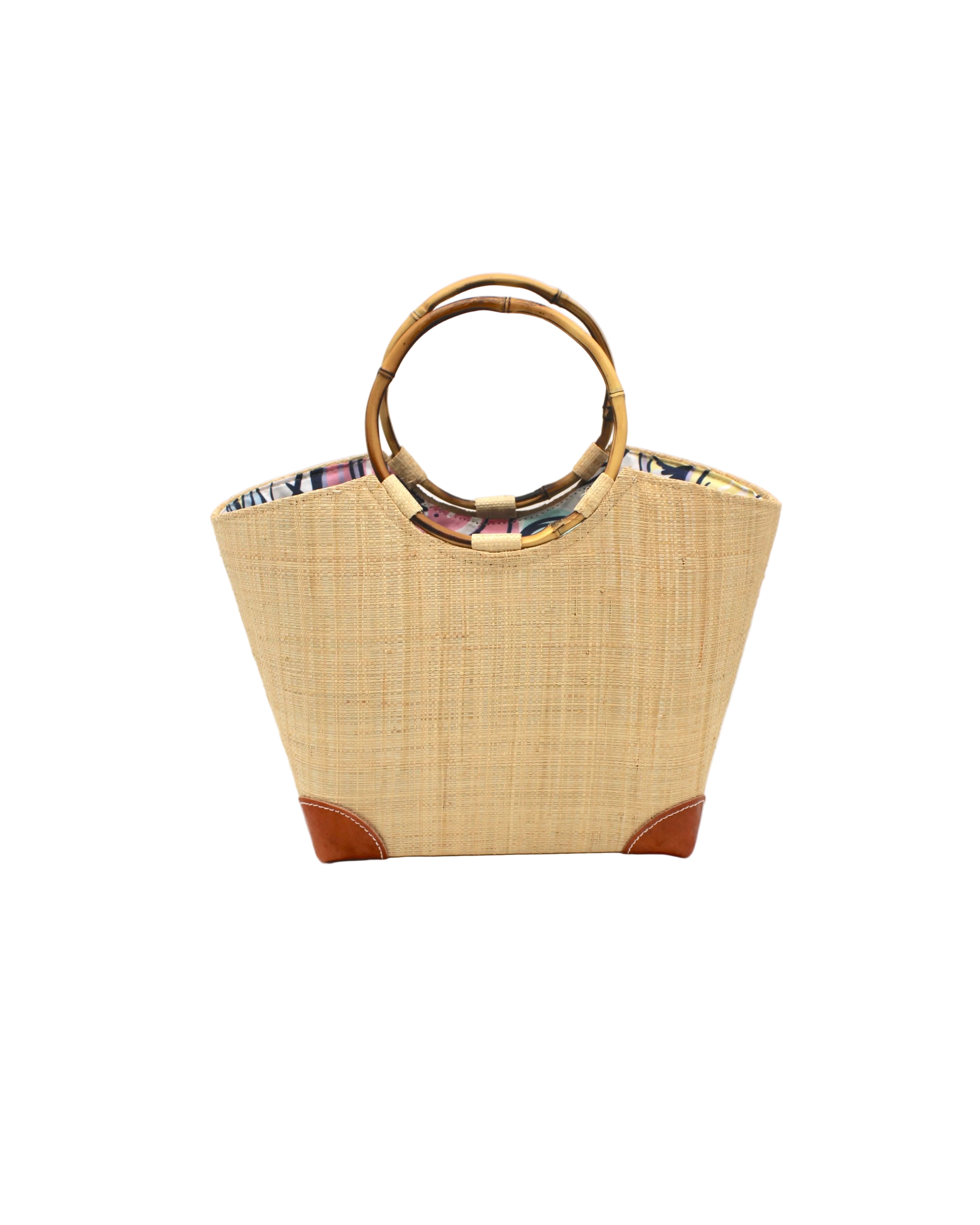 Betty Straw Bucket Bag with Bamboo Handles handmade loomed natural raffia palm fiber in a solid hue of natural straw color with circular bamboo handles, leather feet, and colorful African Print wax cloth liner handbag purse tote - Shebobo