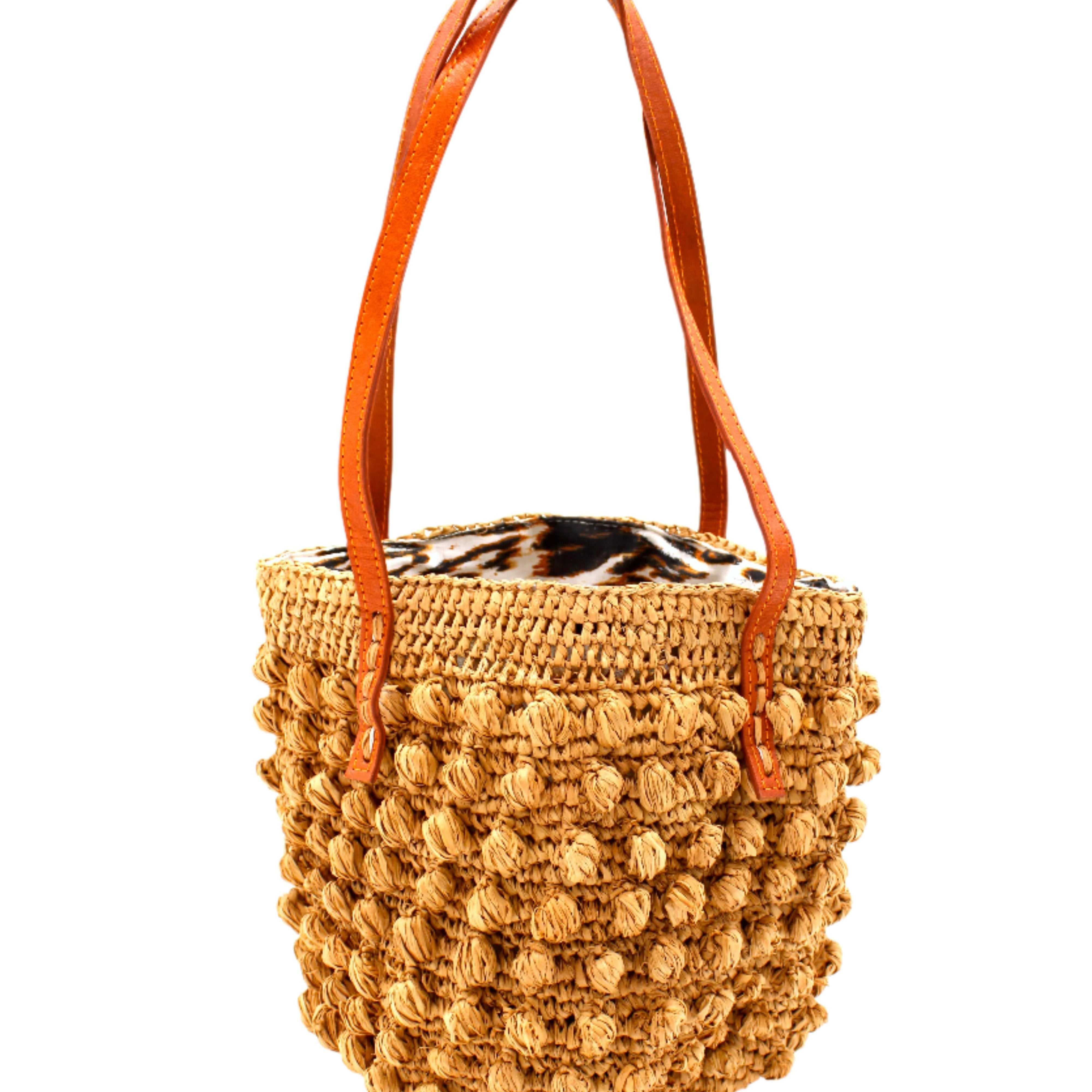 Boucle Cappuccino Crochet Small Straw Handbag handmade woven raffia palm fiber in a solid hue of cappuccino light/brown/beige in a supple nub/ball texture of horizontal bands around the bag with link weave around the top plus assorted print drawstring liner and leather handles shoulder bag purse - Shebobo