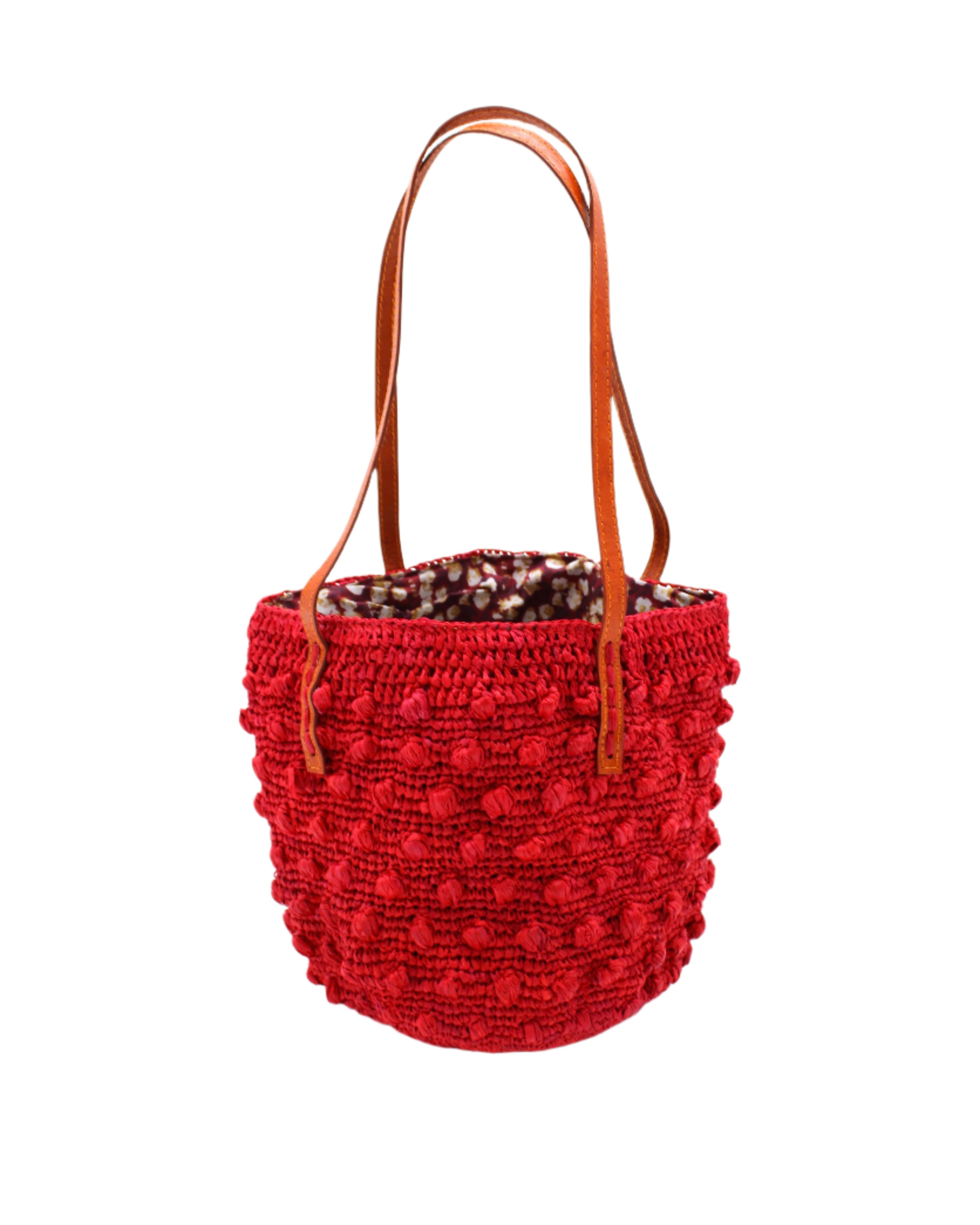 Boucle Red Crochet Small Straw Handbag handmade woven raffia palm fiber in a solid hue of red in a supple nub/ball texture of horizontal bands around the bag with link weave around the top plus assorted print drawstring liner and leather handles shoulder bag purse - Shebobo