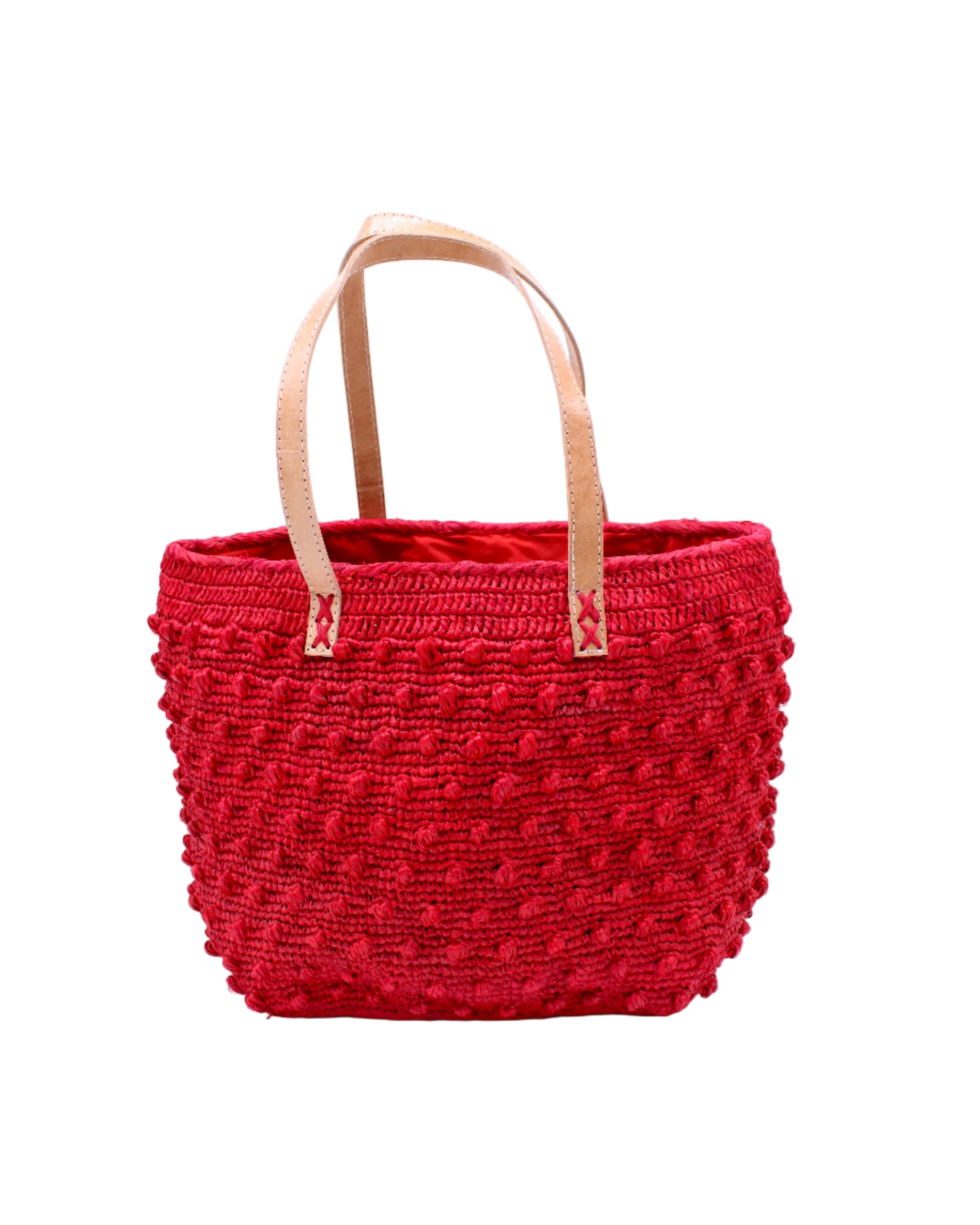 Boucle Red Crochet Straw Basket Bag handmade woven raffia palm fiber in a solid hue of red in a supple nub/ball texture of horizontal bands around the bag with link weave around the top and loop crochet edging on the bottom and top plus leather handles beach bag shoulder bag purse - Shebobo