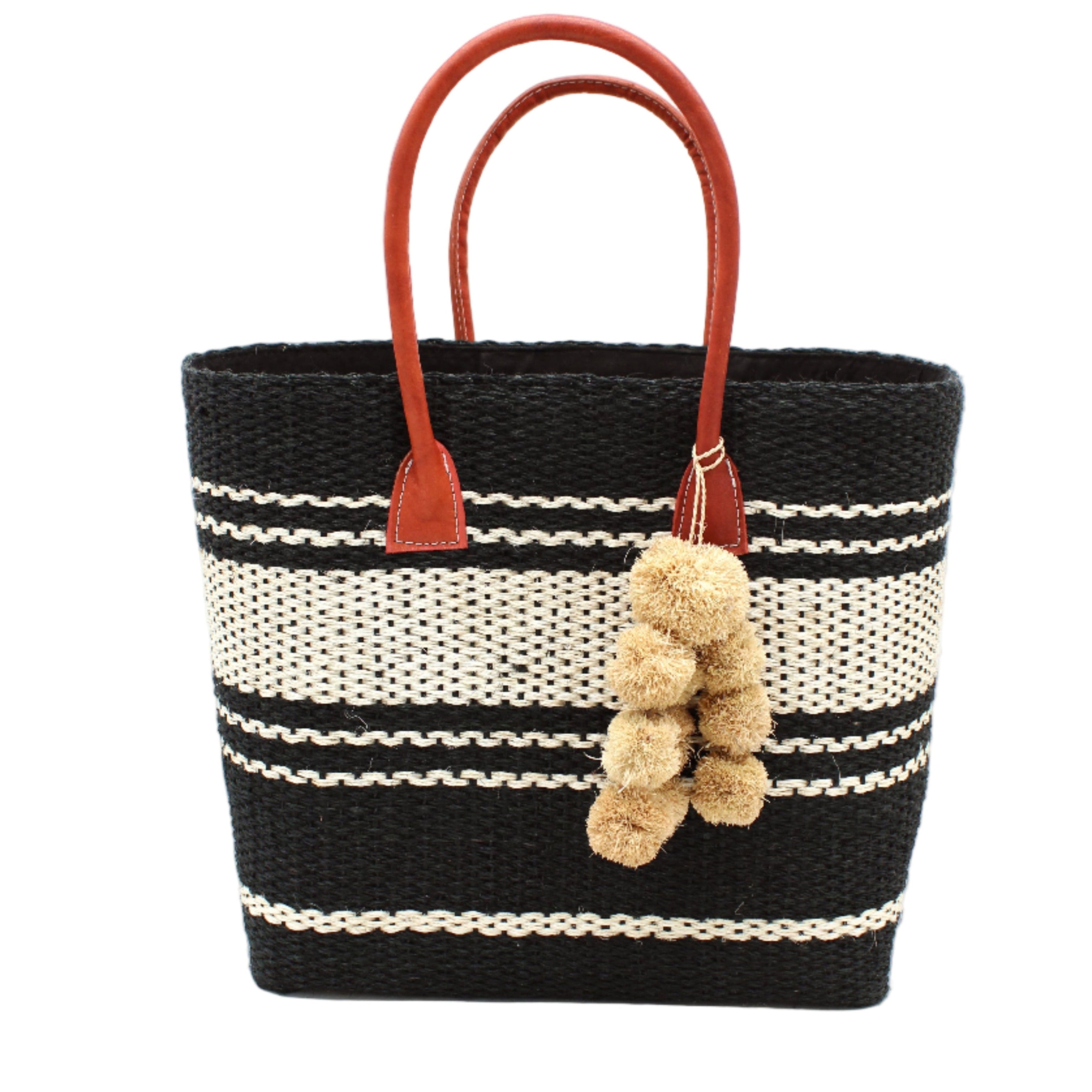 Cabrillo Sisal Basket Bag with Waterfall Pompoms Charm Embellishment handmade natural sisal fiber woven into a multicolor two tone Black and natural straw color horizontal stripe pattern with muti-width bands of color plus leather handles and natural raffia charm shoulder bag beach bag - Shebobo