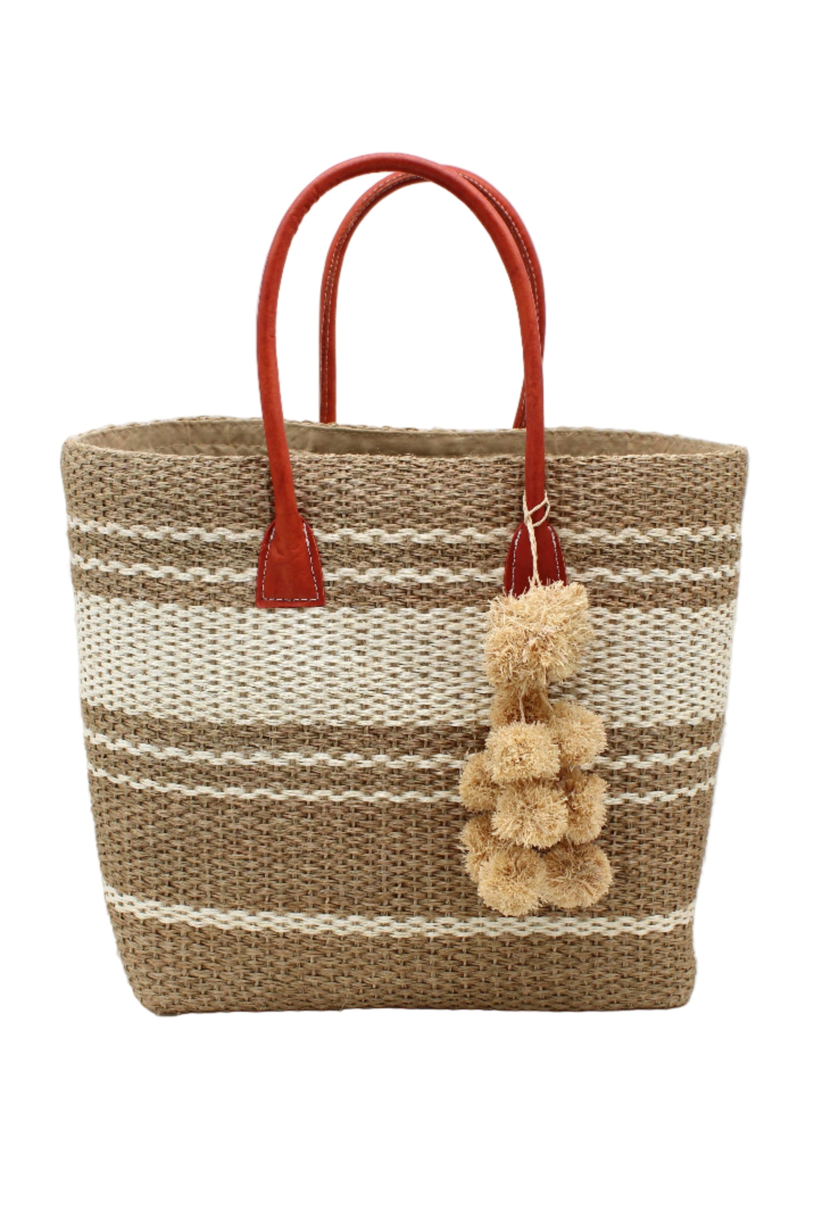Cabrillo Sisal Basket Bag with Waterfall Pompoms Charm Embellishment handmade natural sisal fiber woven into a multicolor two tone Cappuccino tea/light/brown and natural straw color horizontal stripe pattern with muti-width bands of color plus leather handles and natural raffia charm shoulder bag beach bag - Shebobo
