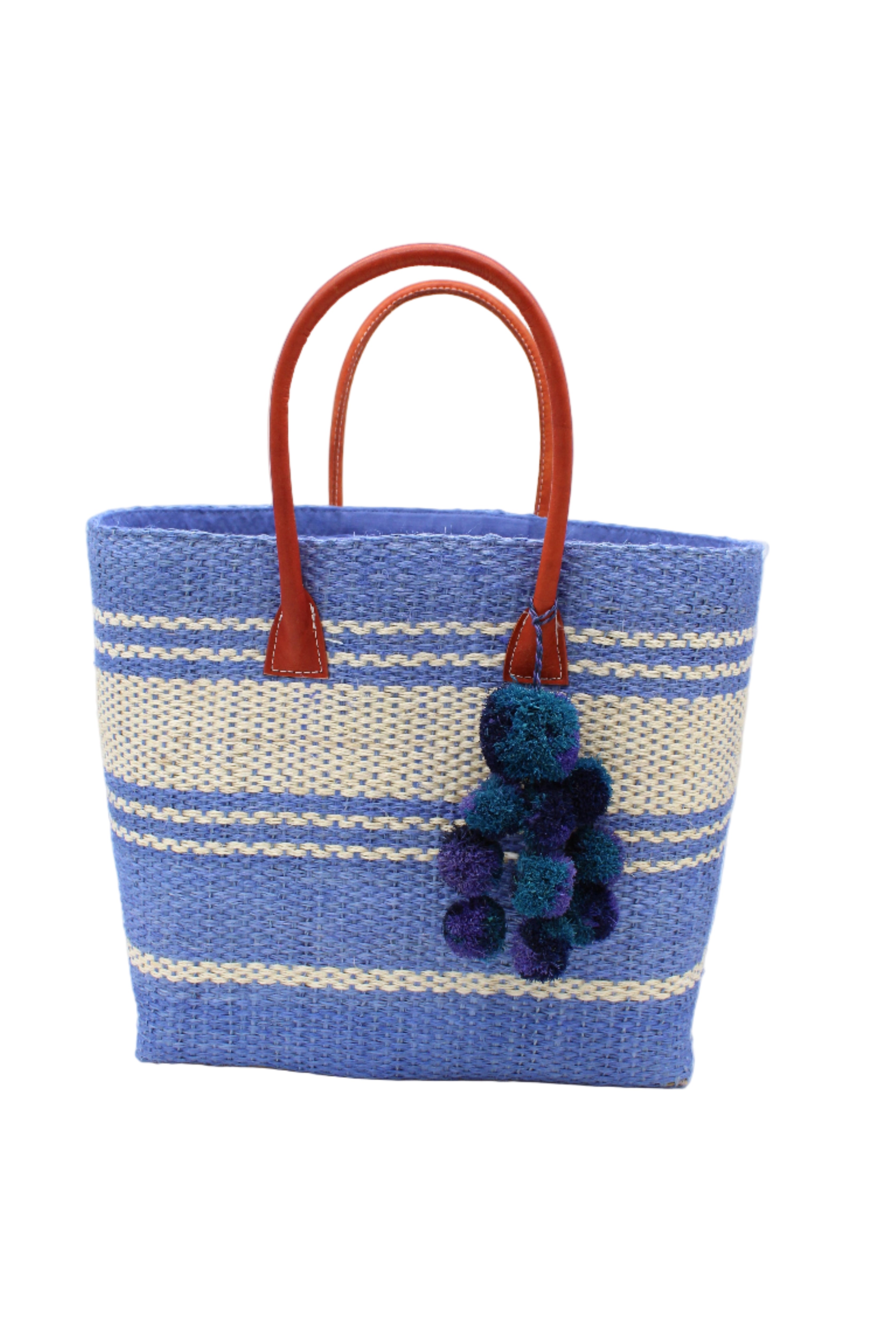 Cabrillo Sisal Basket Bag with Waterfall Pompoms Charm Embellishment handmade natural sisal fiber woven into a multicolor two tone Denim retro/light/blue and natural straw color horizontal stripe pattern with muti-width bands of color plus leather handles and multicolor raffia charm shoulder bag beach bag - Shebobo