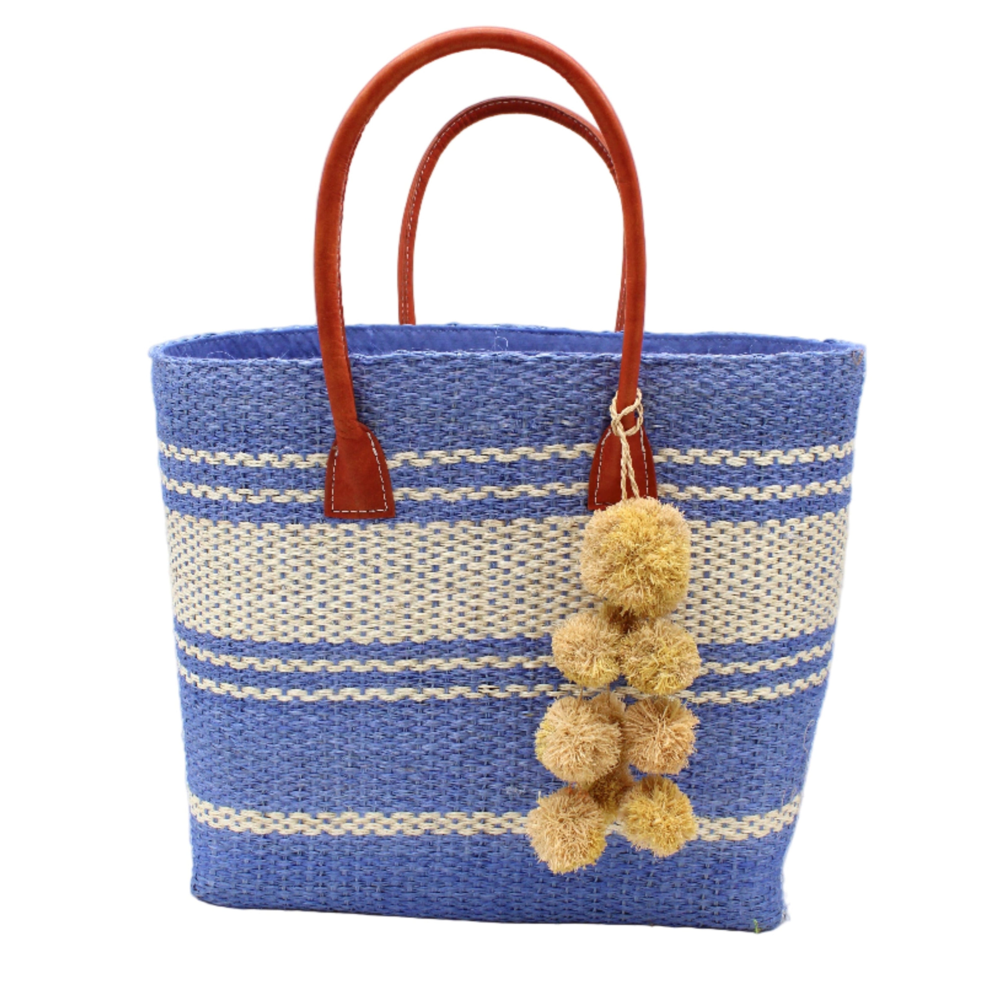 Cabrillo Sisal Basket Bag with Waterfall Pompoms Charm Embellishment handmade natural sisal fiber woven into a multicolor two tone Denim retro/light/blue and natural straw color horizontal stripe pattern with muti-width bands of color plus leather handles and natural raffia charm shoulder bag beach bag - Shebobo