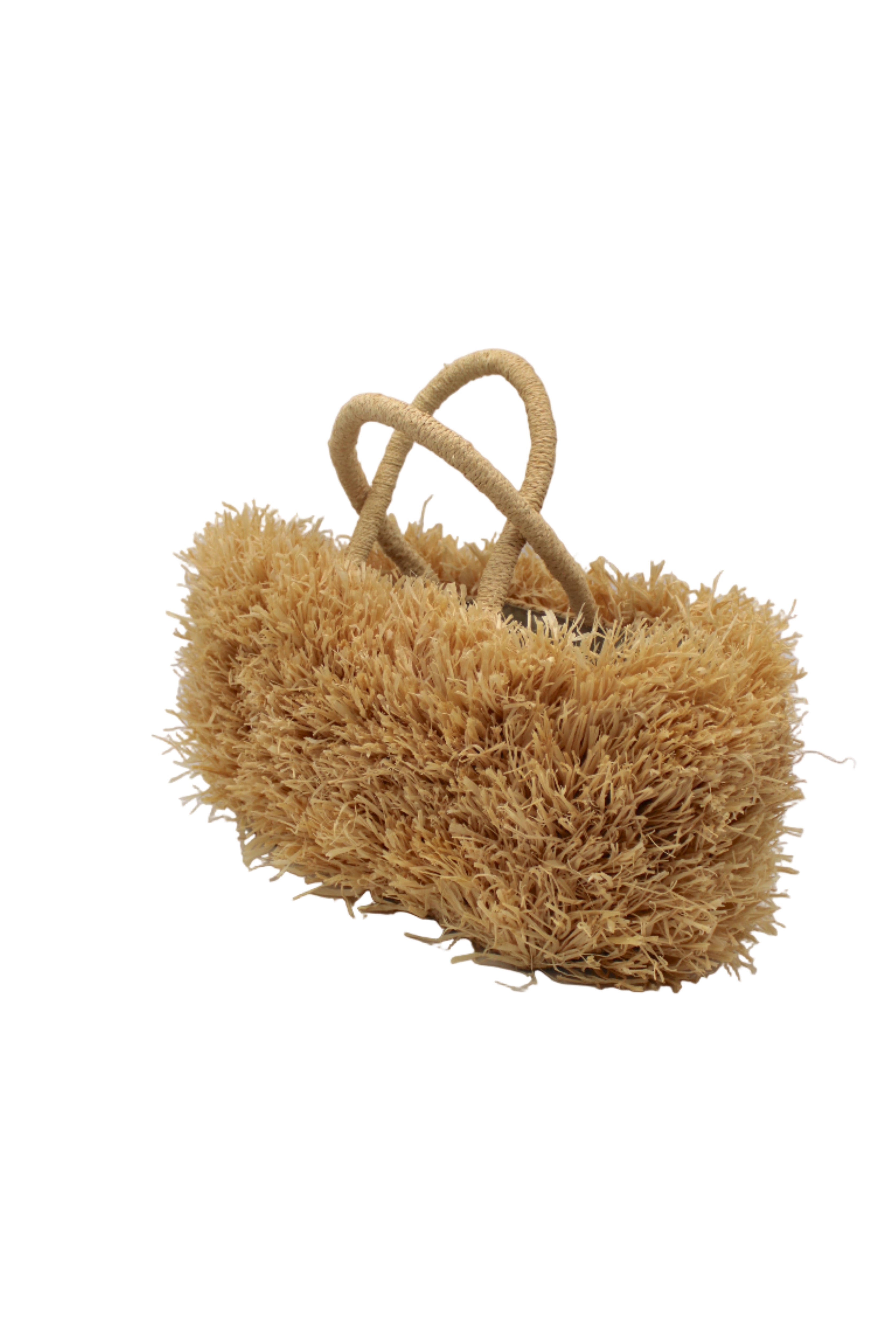 Side view Calypso Pompom Pouf Crochet Straw Basket Handbag handmade natural raffia palm fiber in a solid hue of Natural straw color with brushed fringe strands crochet and knotted into a pouf texture with matching wrapped handles purse - Shebobo