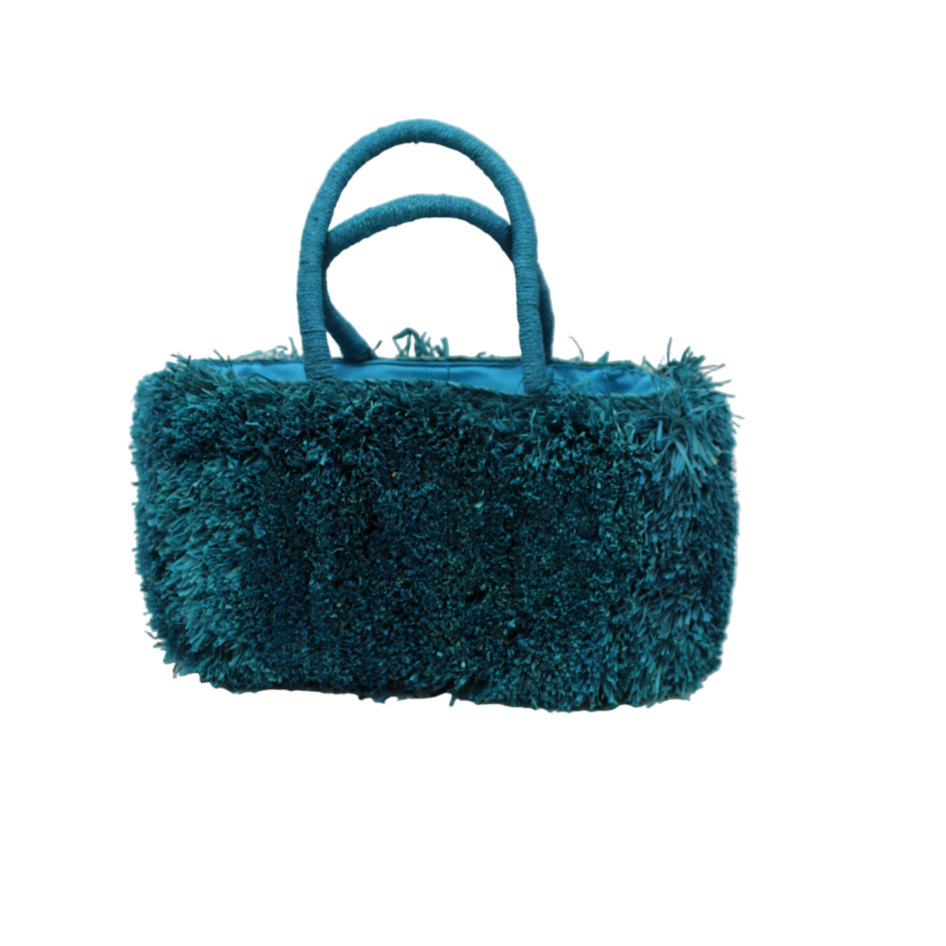 Calypso Pompom Pouf Crochet Straw Basket Handbag handmade natural raffia palm fiber in a solid hue of Turquoise blue/green with brushed fringe strands crochet and knotted into a pouf texture with matching wrapped handles purse - Shebobo