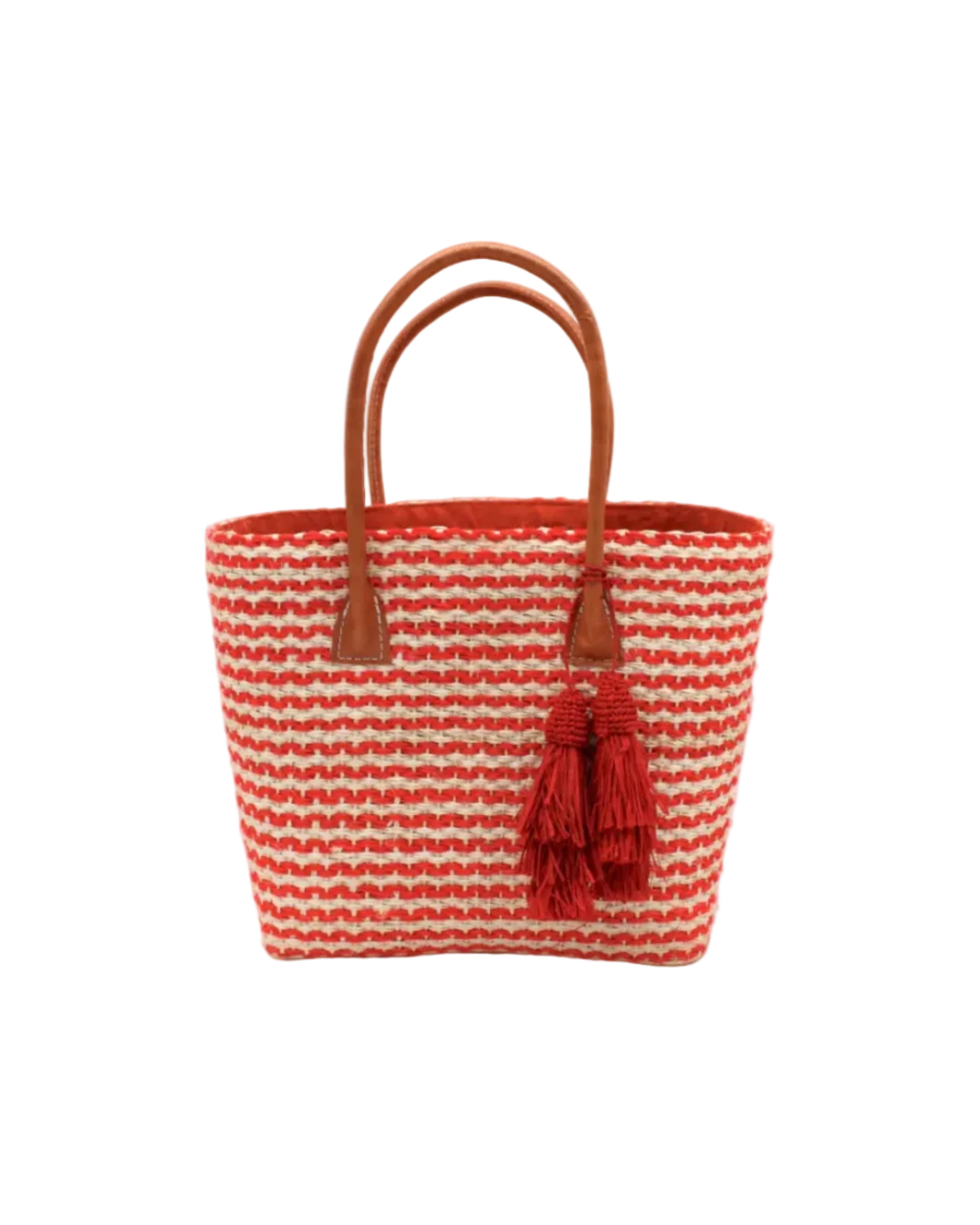 Cancun Small Sisal Basket Bag with Tassel Charm handmade natural sisal fibers woven into even width horizontal bands of coral orange and natural straw color that create a pinstripe pattern with matching knotted raffia tufts tassel charm embellishment and leather handles beach bag - Shebobo