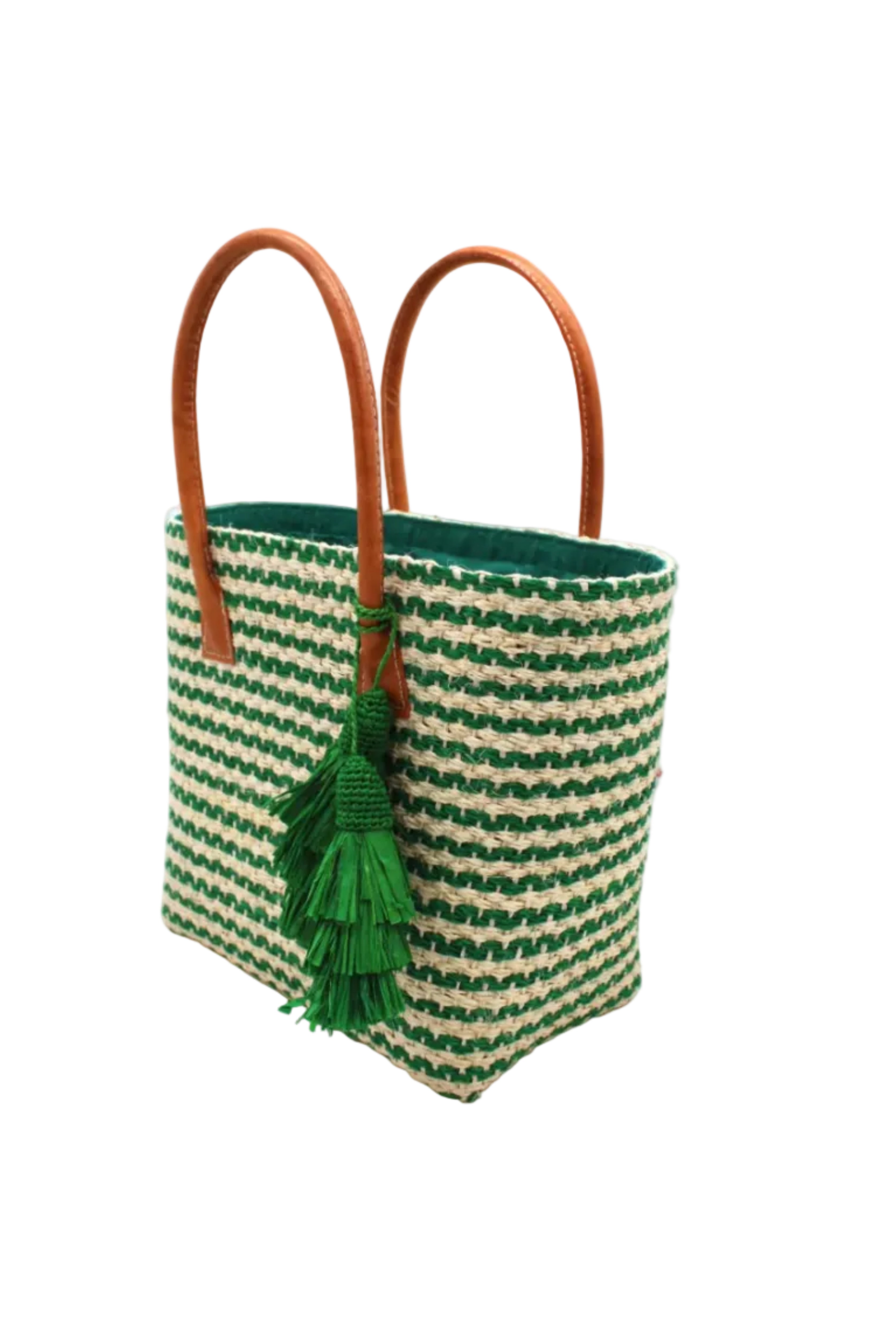 Side view Cancun Small Sisal Basket Bag with Tassel Charm handmade natural sisal fibers woven into even width horizontal bands of deep green and natural straw color that create a pinstripe pattern with matching knotted raffia tufts tassel charm embellishment and leather handles beach bag - Shebobo