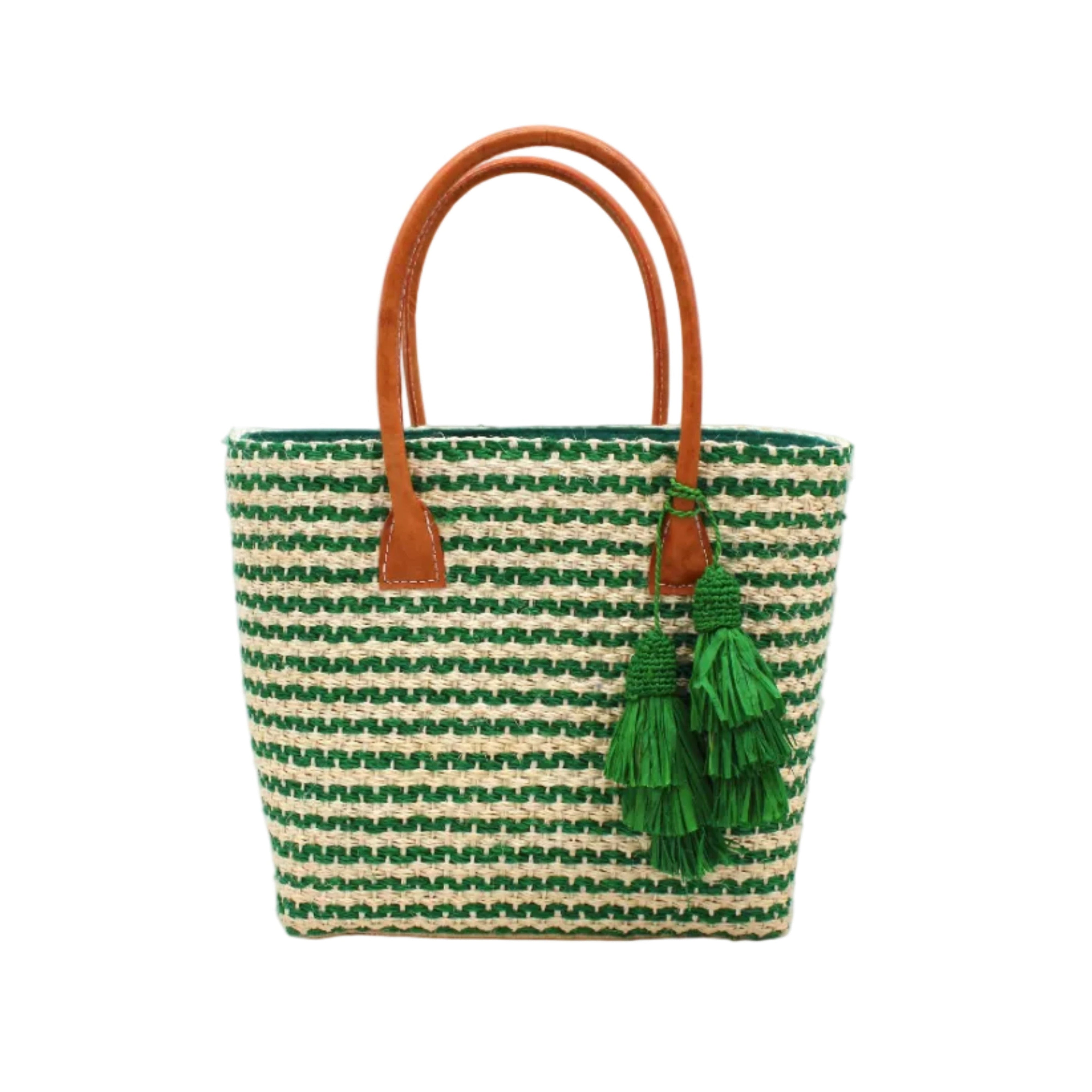 Cancun Small Sisal Basket Bag with Tassel Charm handmade natural sisal fibers woven into even width horizontal bands of deep green and natural straw color that create a pinstripe pattern with matching knotted raffia tufts tassel charm embellishment and leather handles beach bag - Shebobo