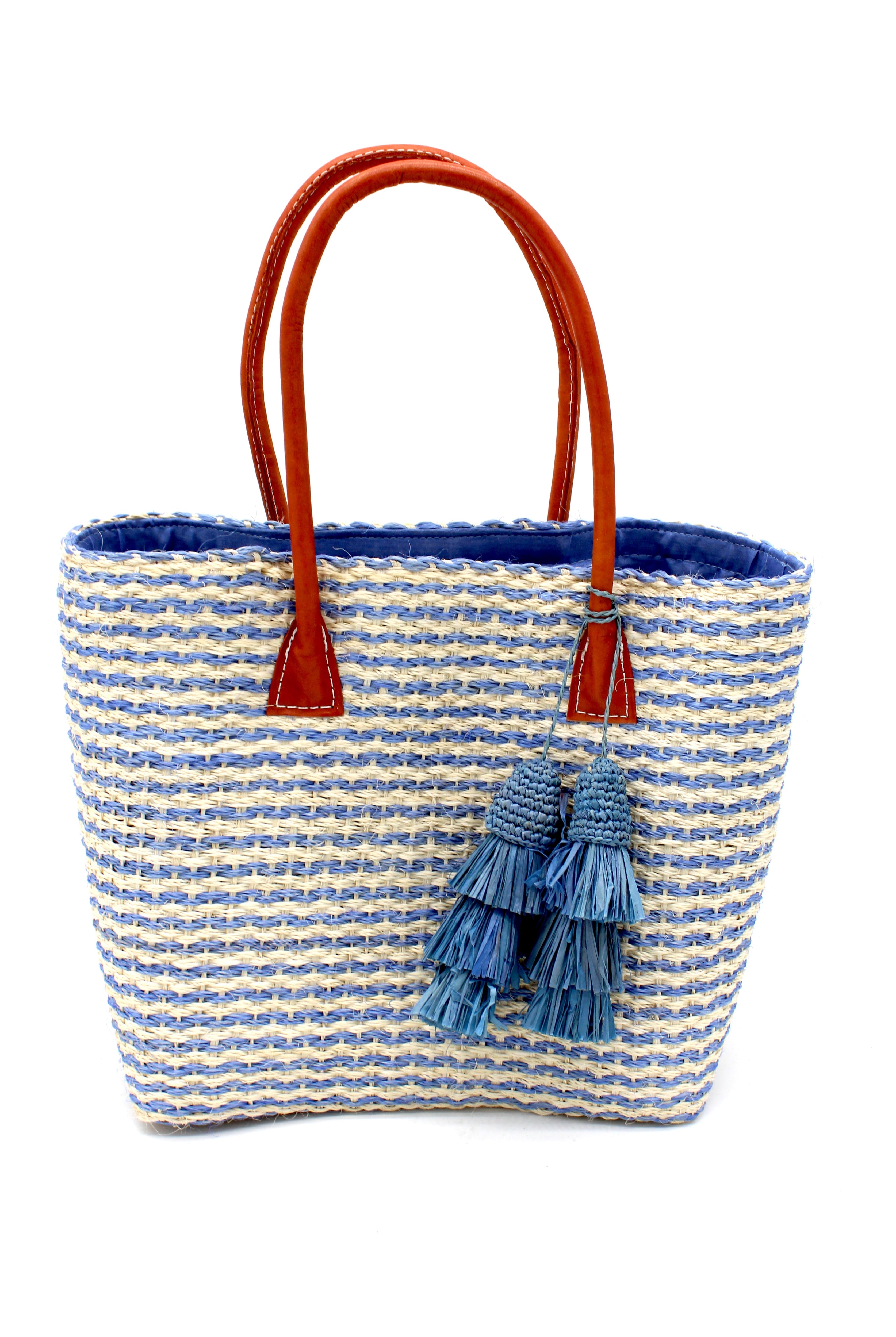 Cancun Small Sisal Basket Bag with Tassel Charm handmade natural sisal fibers woven into even width horizontal bands of denim/retro/light blue and natural straw color that create a pinstripe pattern with matching knotted raffia tufts tassel charm embellishment and leather handles beach bag - Shebob