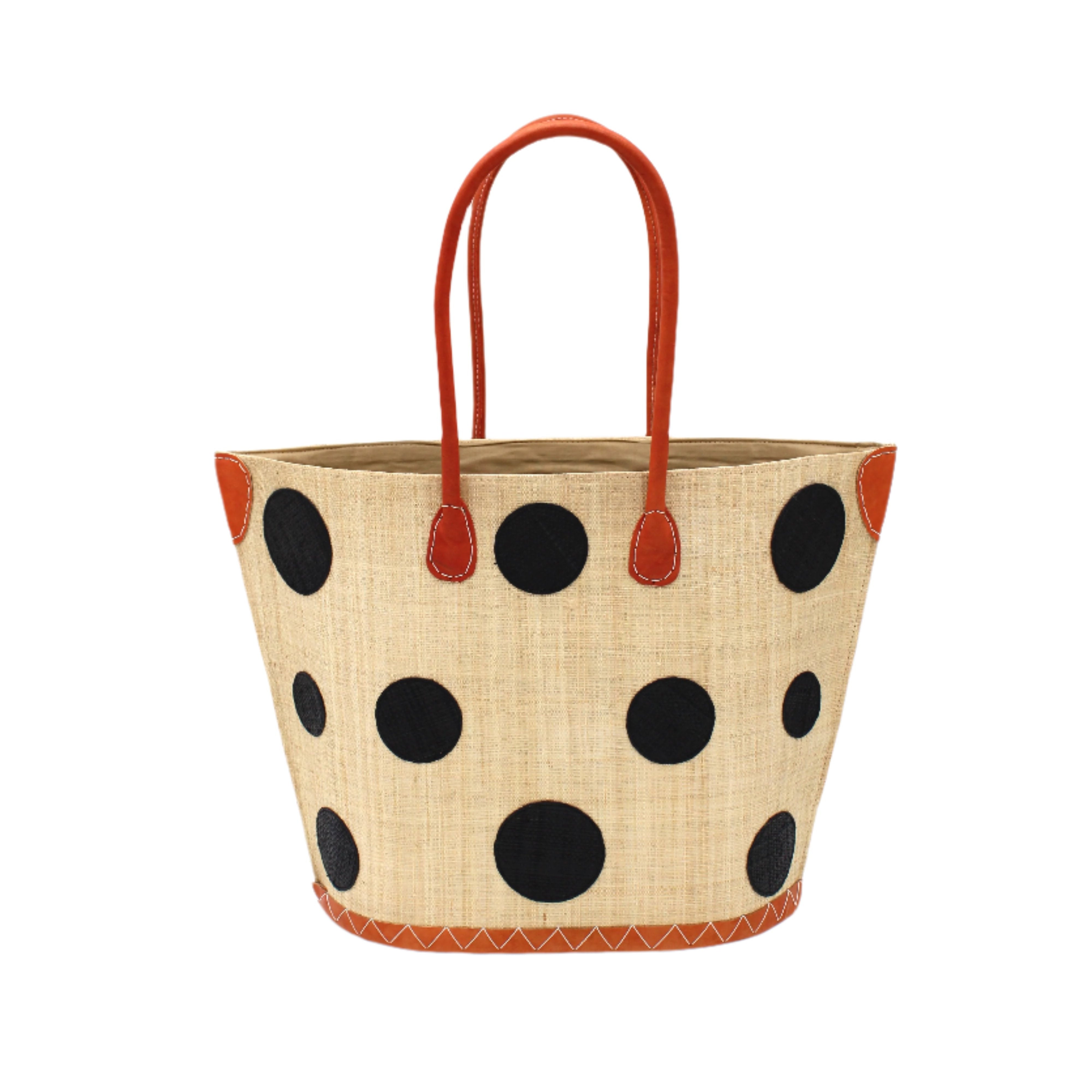 Capri Polka Dot Black Small Straw Tote Bag handmade loomed raffia palm fiber in a solid hue of natural straw color with various sized black dots stitched on in a random pattern with leather handles and accents handbag shoulder bag beach bag - Shebobo