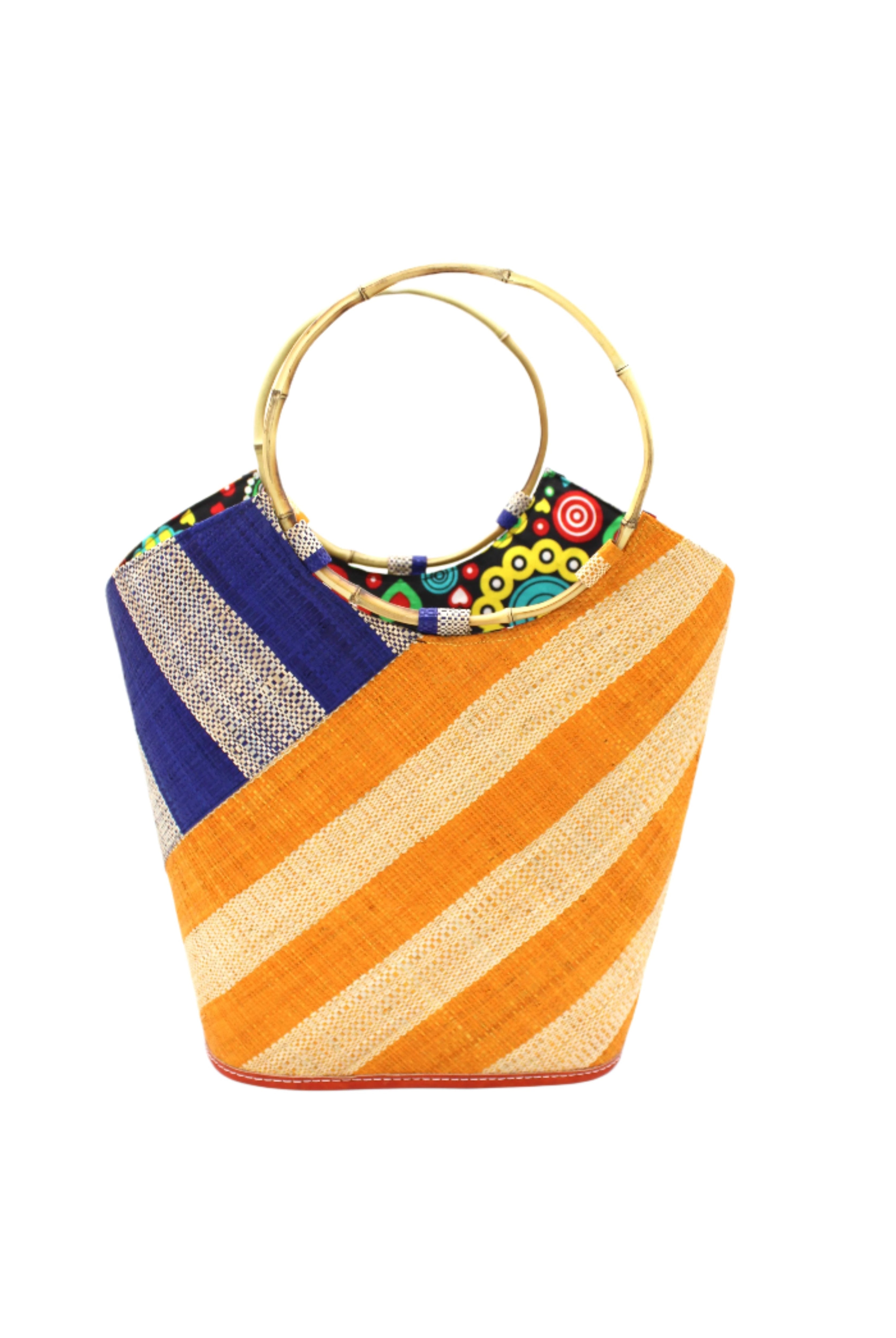 Carmen Double Wide Stripe Saffron & Dusk Straw Bucket Bag w/ Bamboo Handle handmade loomed raffia palm fiber in even width wide stripe pattern of Saffron yellow/orange and natural straw color oriented on the diagonal of three quarters of the bag with matching stripe pattern of dusk navy/dark/blue and natural diagonally on the top left corner quarter shoulder bag handbag - Shebobo