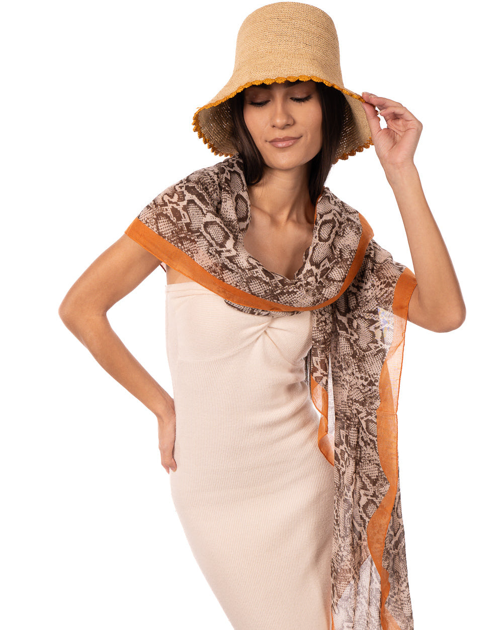 Model wearing Cleo Snake Print Scarf Wrap Coral Orange, Black, and White Multicolor Snake Skin Patterned Scarf with colored edge - Shebobo (with Kate 3" Brim Crochet Bucket Straw Sun Hats)