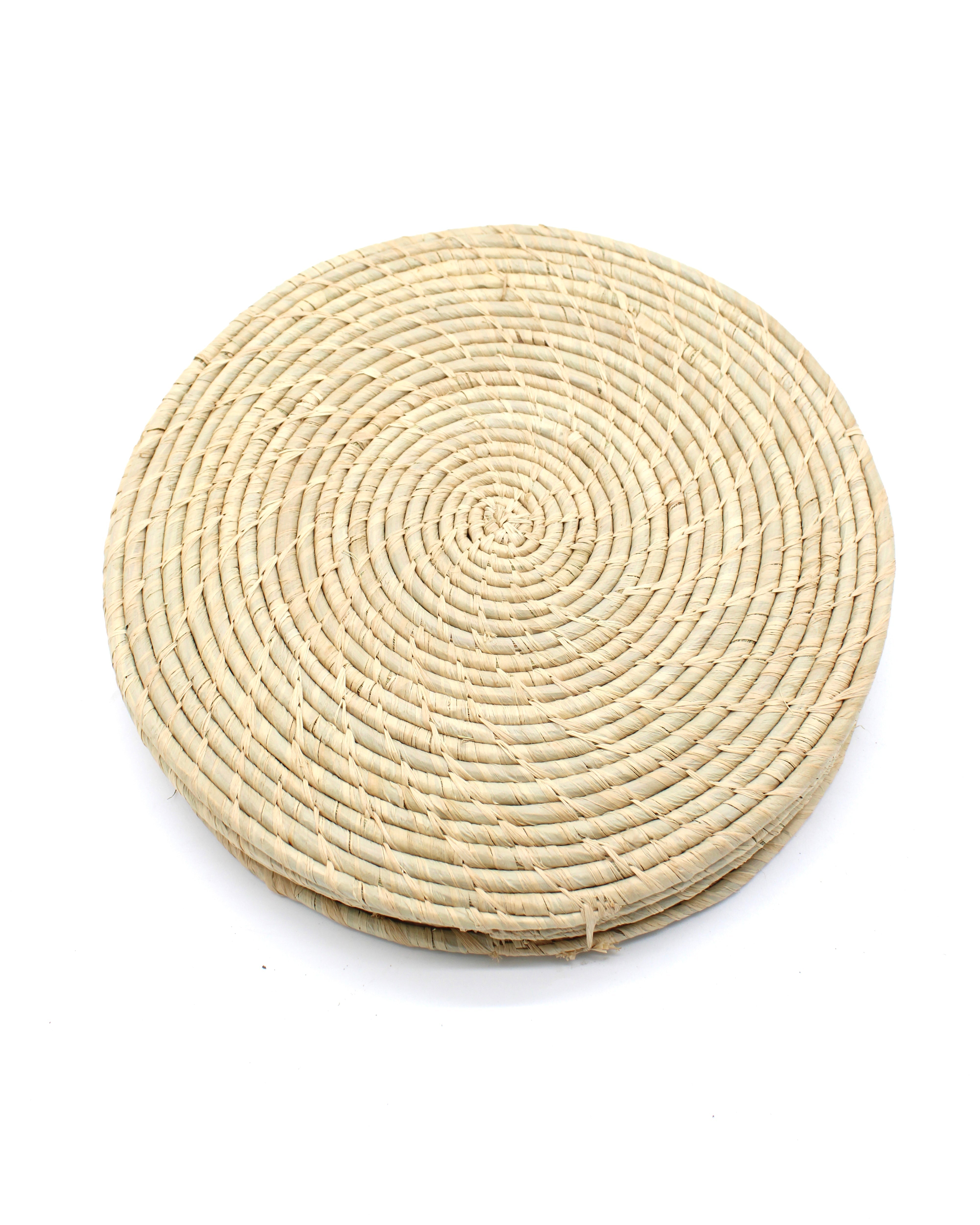 Dabu Round Two Tone Swirl Raffia Straw Coasters & Placemats Set of 6 handmade natural raffia palm fiber in a crochet loop disc technique creating concentric circular stripe pattern of texture in a solid hue of natural straw color with matching knotted spiral swirl weave sets of six placemats or coasters - Shebobo
