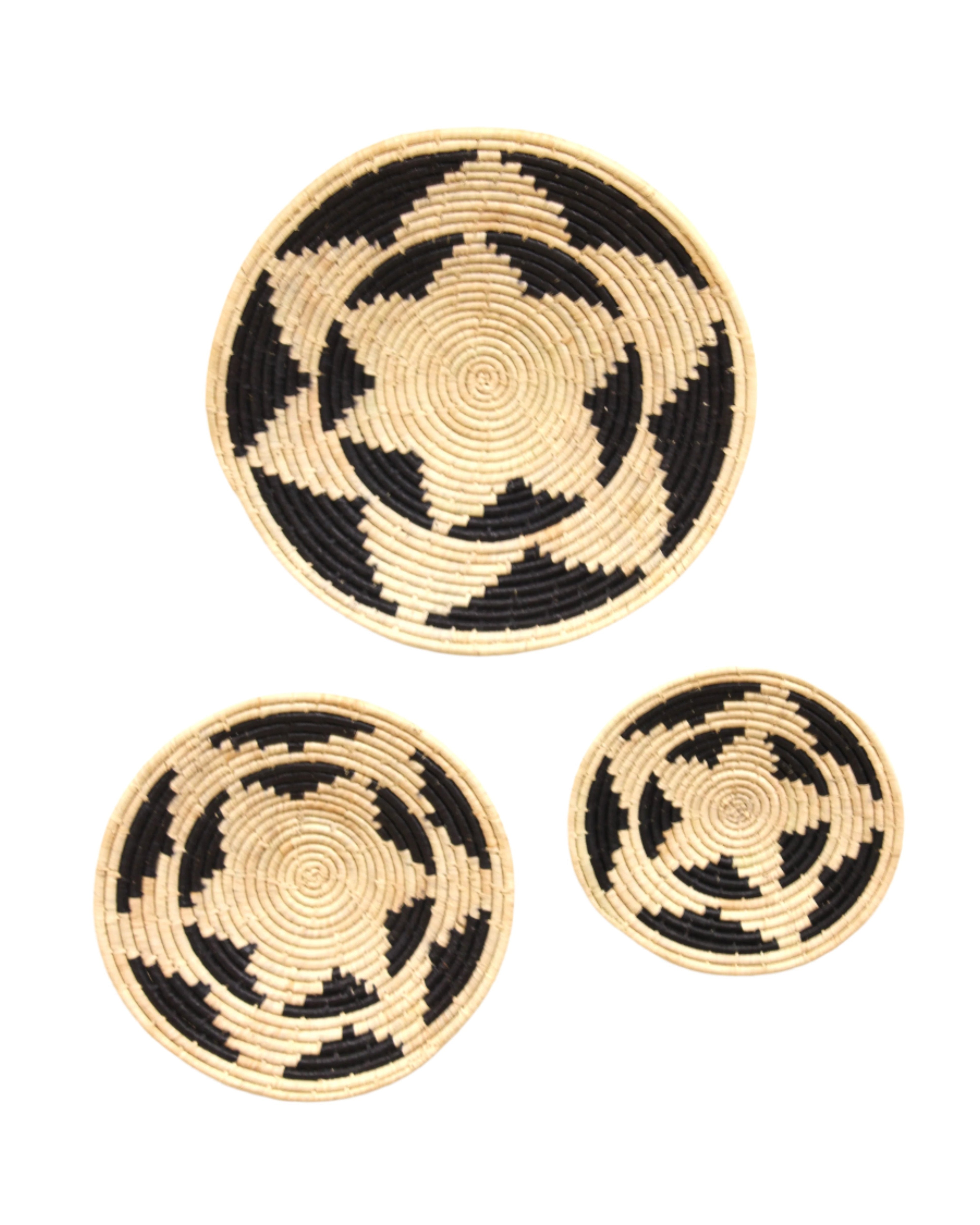 Dakarai Raffia Straw Wall Decor Display Basket Tray: Set of 3 handmade woven natural raffia palm fiber in a crochet loop technique concentric coiled circular pattern with double natural straw color and black centered star flower pattern set of three sized flat bowl trays - Shebobo