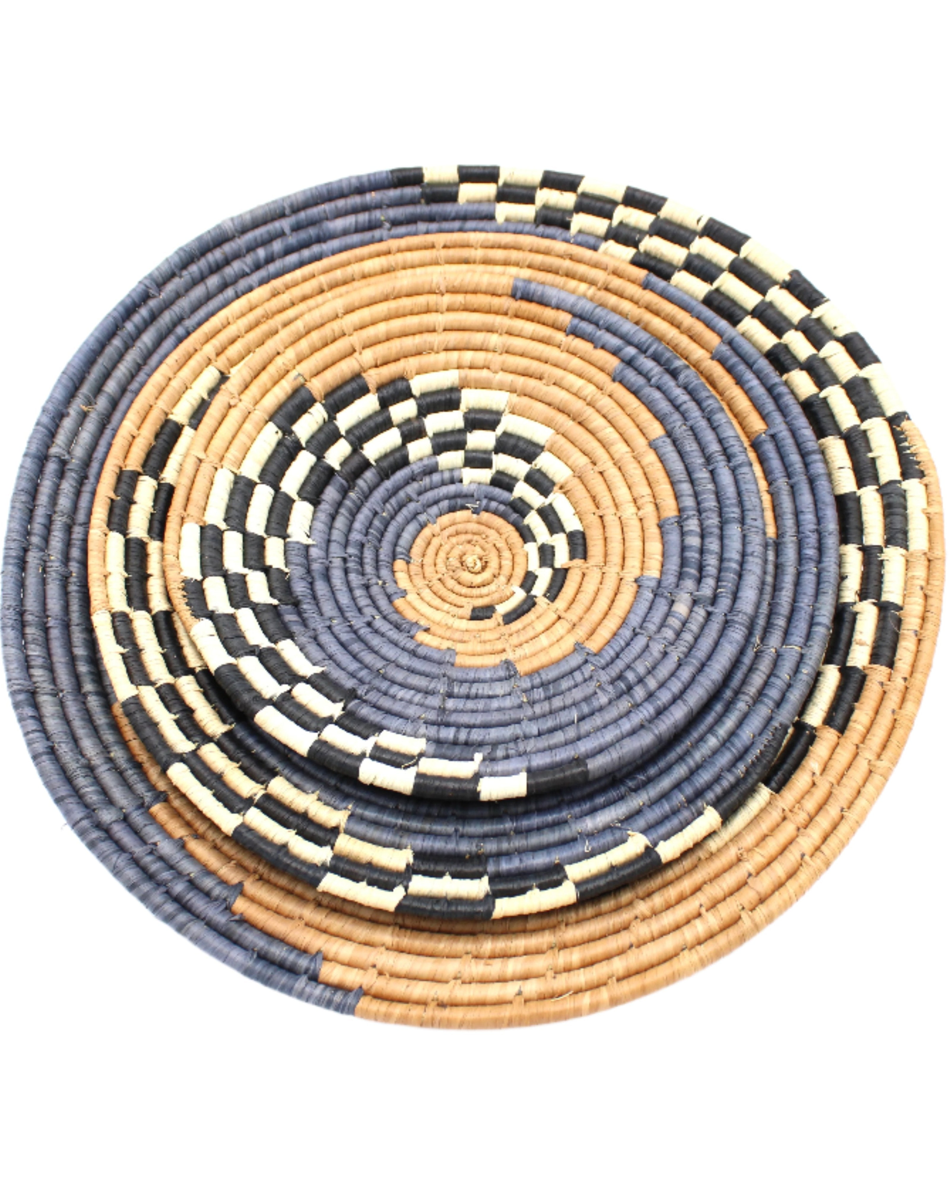 Detail view Dakarai Raffia Straw Wall Decor Display Basket Trays: Set of 3 handmade woven raffia palm fiber in a crochet loop technique creating a concentric swirl pattern of bands of cinnamon/tobacco/brown, grey, and black and natural straw color checked pattern in a three tone spiral from the center to the outer edge set of three sized flat bowl trays - Shebobo