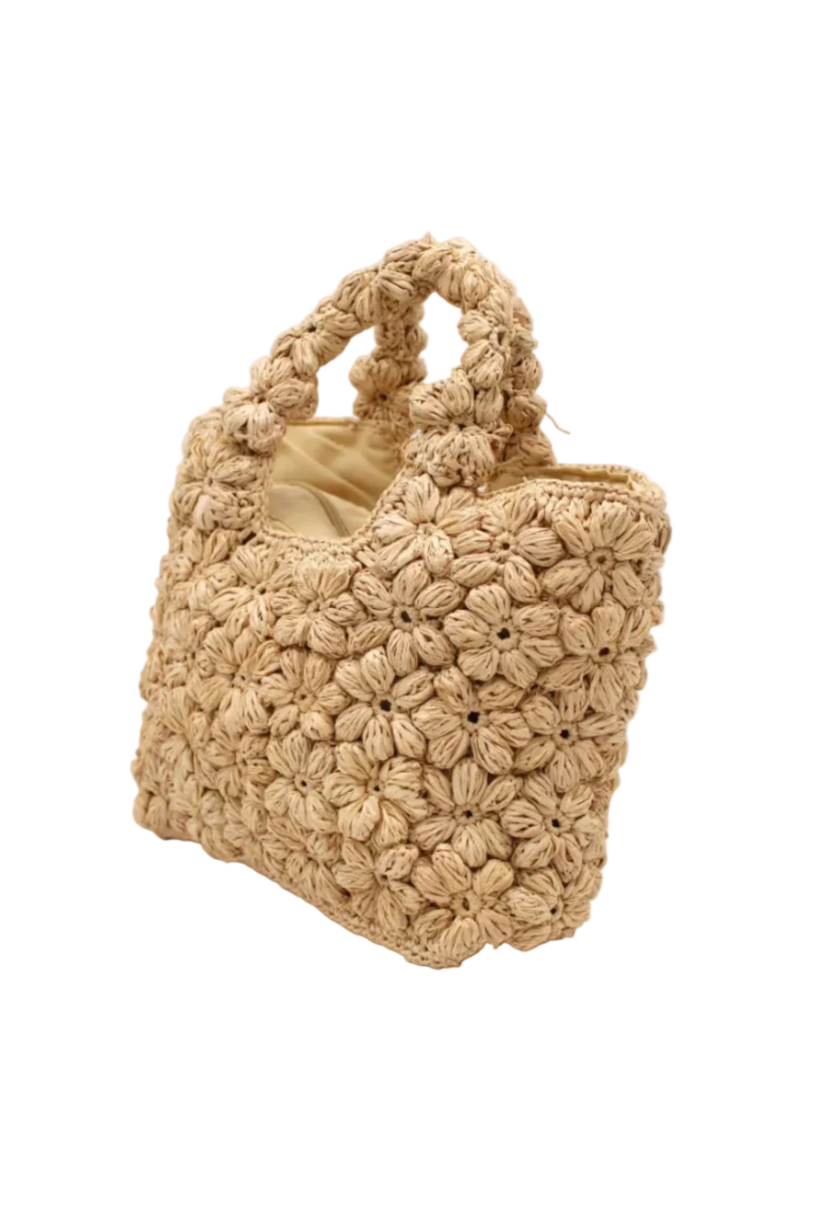 Side view Florence Flower Crochet Straw Basket Handbag handmade natural raffia palm fiber in a solid hue of natural straw color with subtle tied flower design consisting of 88 flowers crochet together along the outside of the bag as well as the handles purse tote - Shebobo