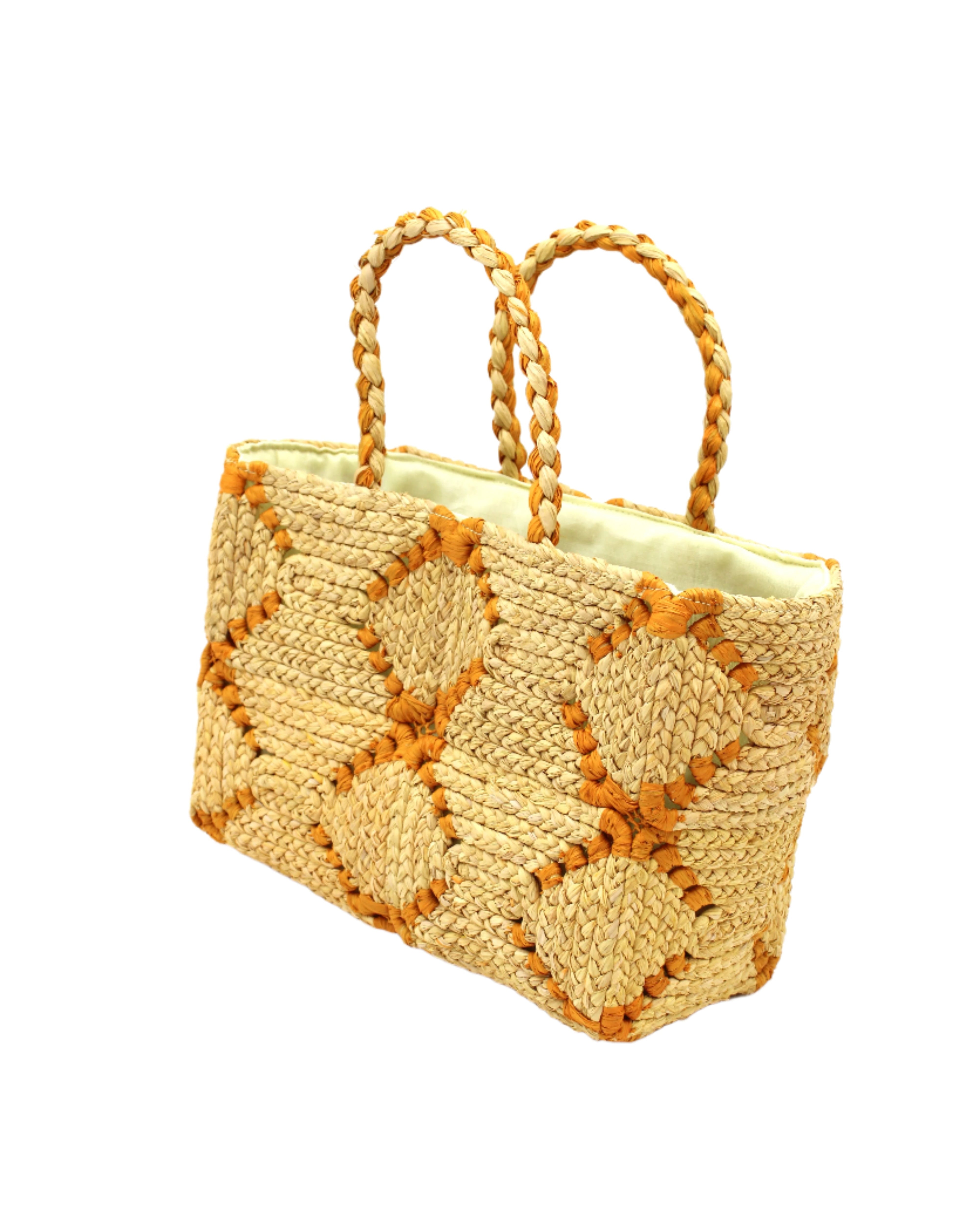 Side view Gemma Crochet Disc Rectangle Butter and Saffron Straw Basket Handbag handmade woven raffia palm fiber in a two tone multicolor pattern of butter light yellow and saffron yellow/orange create a coiled braid disc pattern result in a star pattern around the bag with matching woven handles top handle bag - Shebobo