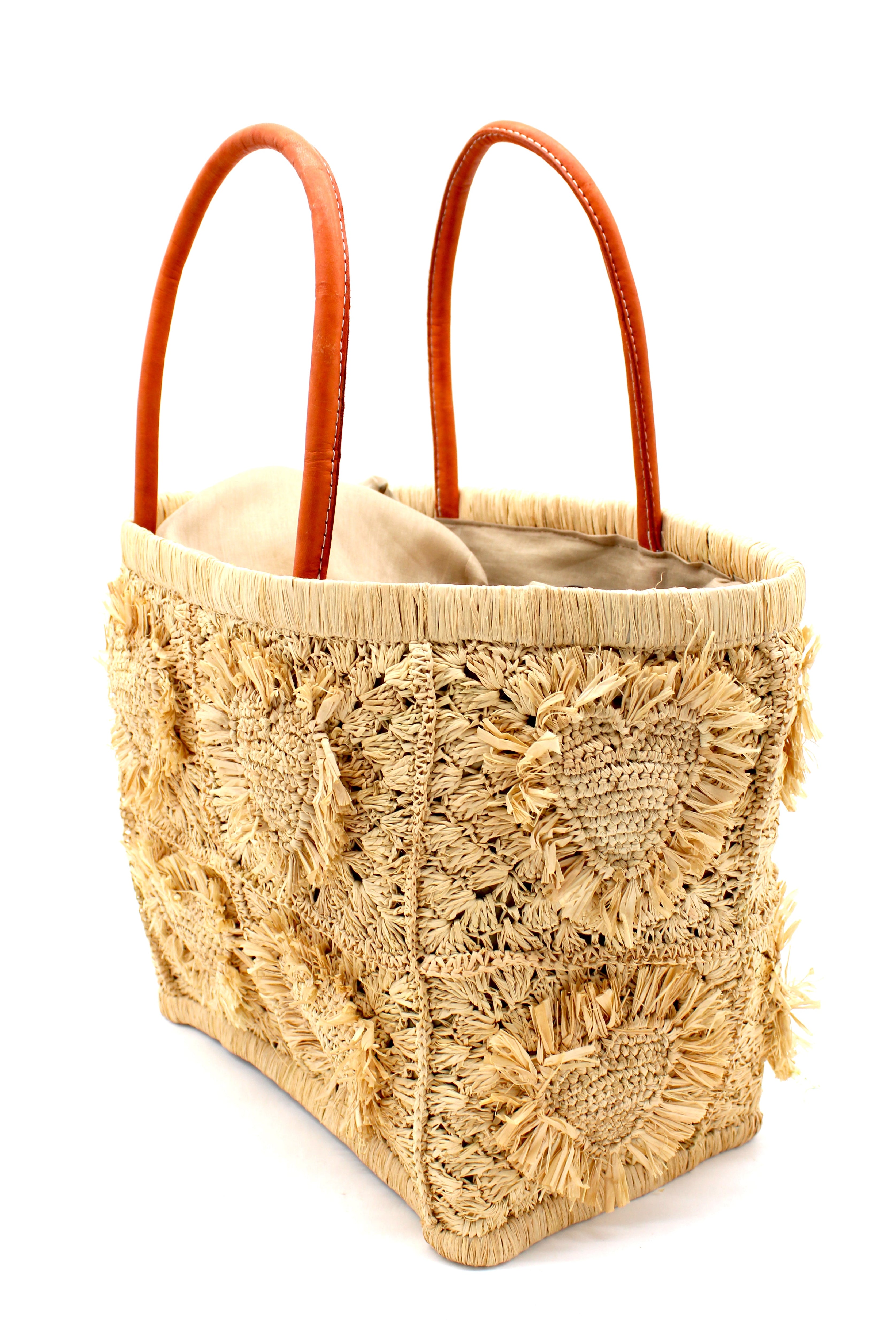 Side View Hearts Crochet Straw Basket Bag with Fringed Heart Pattern handmade woven raffia in a solid hue of natural straw color with granny square pattern and raised/stuffed heart pattern with fringe edges on each heart, looped base and top binding, as well as leather handles purse beach bag shoulder bag - Shebobo