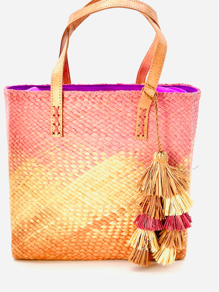 Holden Ombre Blush Straw Handbag Tassel Charm Embellishment handmade woven raffia dip dyed gradient of lavender pink/purple, natural, and blush orange/pink with matching multicolored, multi-tiered raffia tuft tassel - Shebobo