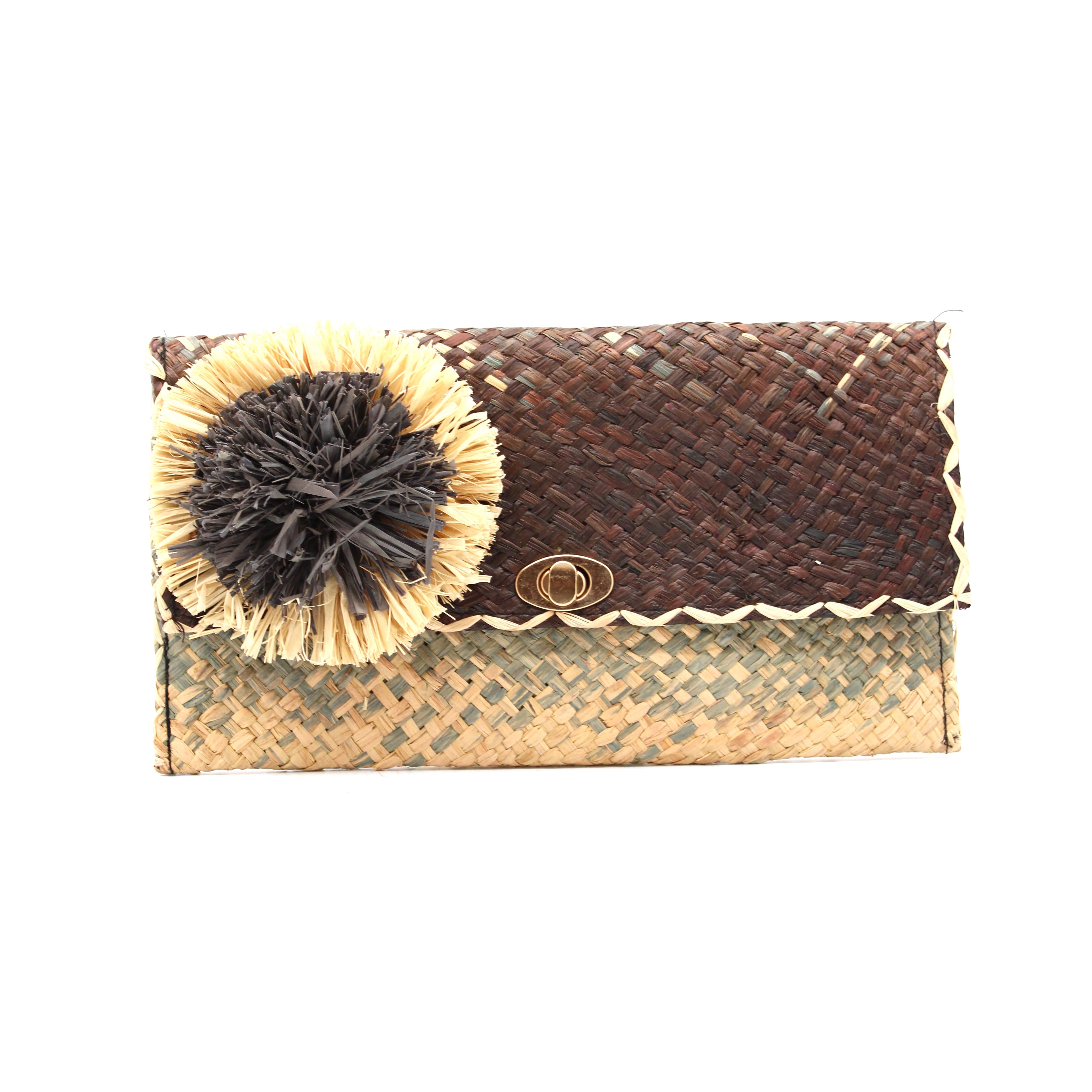 Holden Ombre Black Straw Clutch with Flower Pouf handmade woven raffia dip dyed gradient of black, grey, and natural with large two tone natural and grey fringe flower embellishment - Shebobo