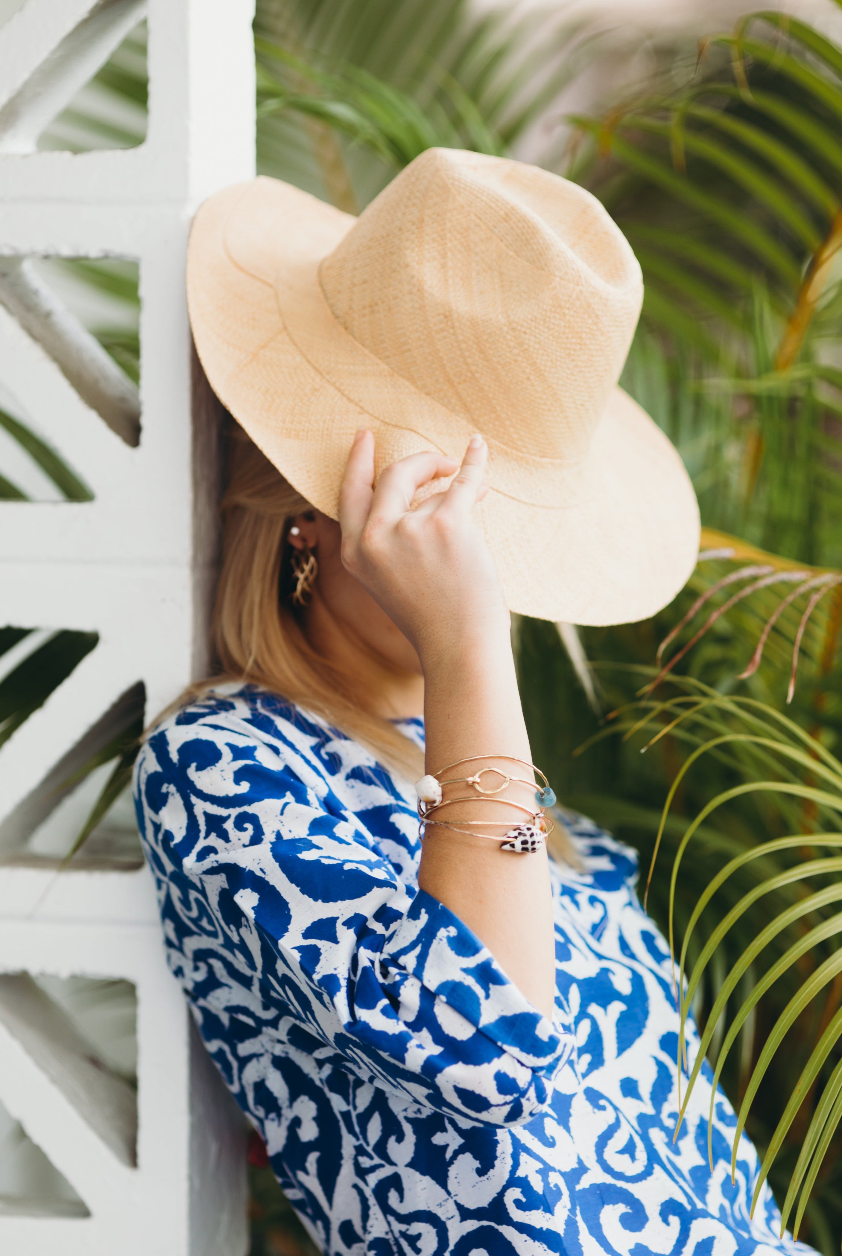 Model wearing Jamie Panama Natural unisex straw hat handmade loomed raffia 3" brim sun hat - Shebobo