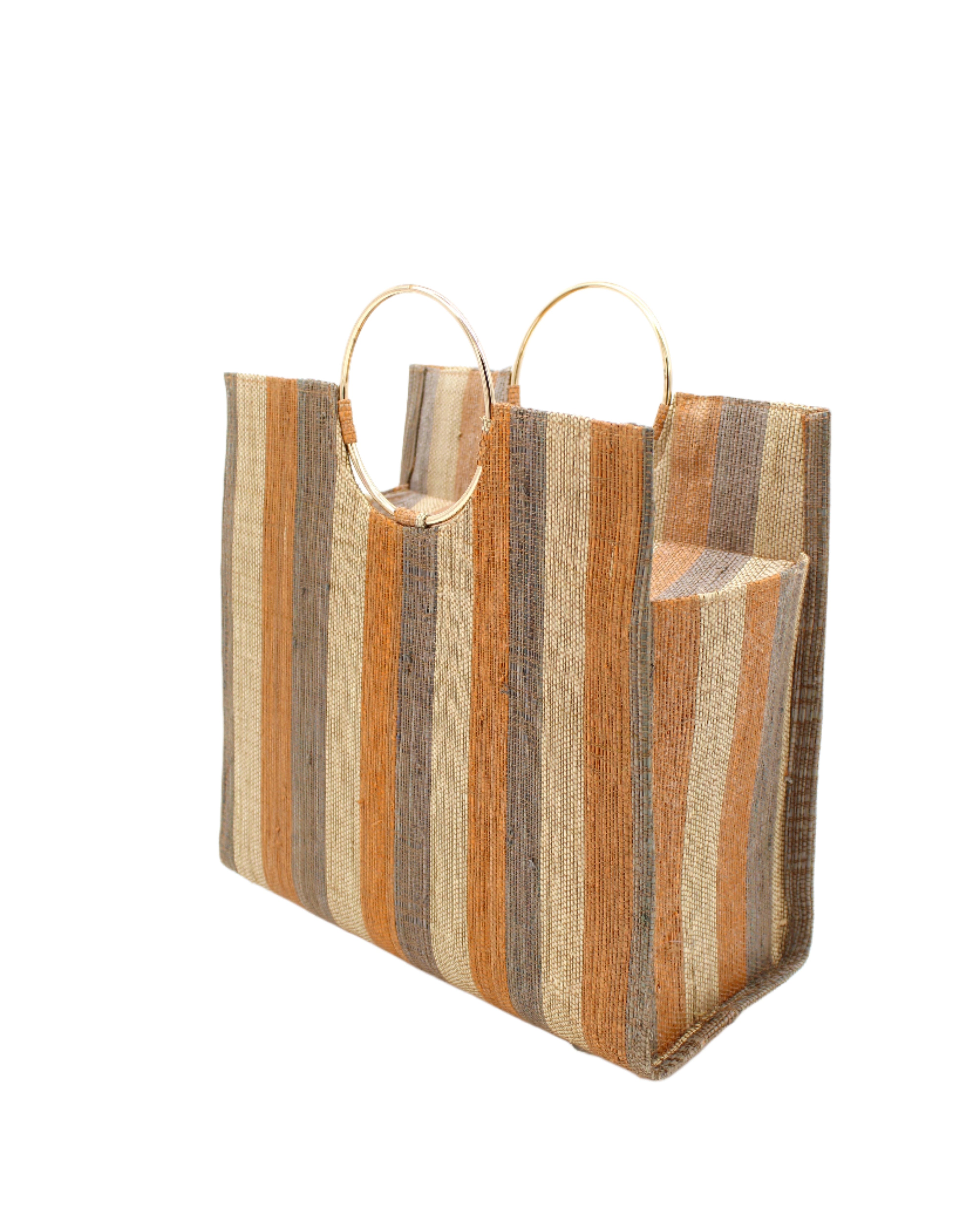 Side View JoJo Woven Straw Handbag with Metal Ring Handle handmade natural raffia palm fiber in a stripe pattern of natural straw color, grey, and blush pink/orange with matching woven thread texture and metallic circular metal ring handle - Shebobo