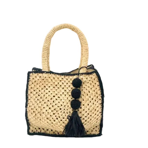 Kimba handmade crochet two tone handbag purse natural straw color with black trim and crochet cascading balls plus tassel bag charm embellishment - Shebobo