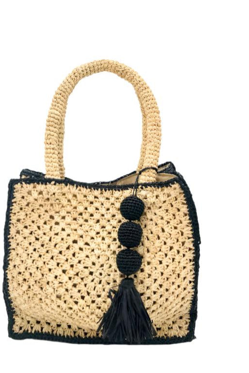 Kimba handmade crochet two tone handbag purse natural straw color with black trim and crochet cascading balls plus tassel bag charm embellishment - Shebobo