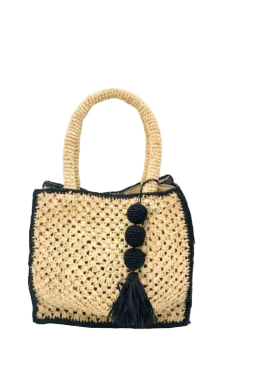 Kimba handmade crochet two tone handbag purse natural straw color with black trim and crochet cascading balls plus tassel bag charm embellishment - Shebobo