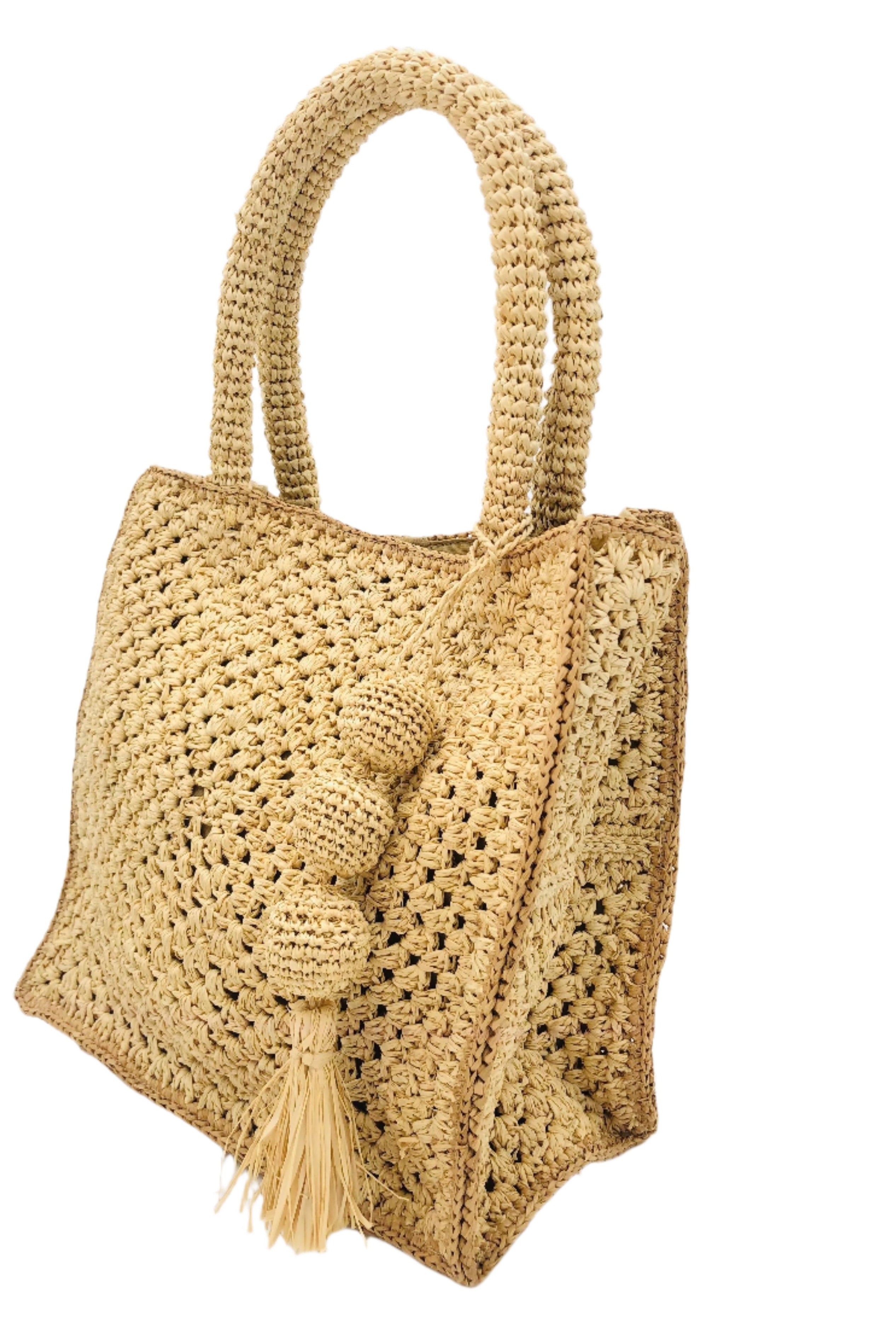 Side view of Kimba Crochet Handbag with Sphere Tassel Charm Embellishment handmade natural raffia palm fibers crochet into a granny square pattern with cappuccino/light brown detail edging - Shebobo