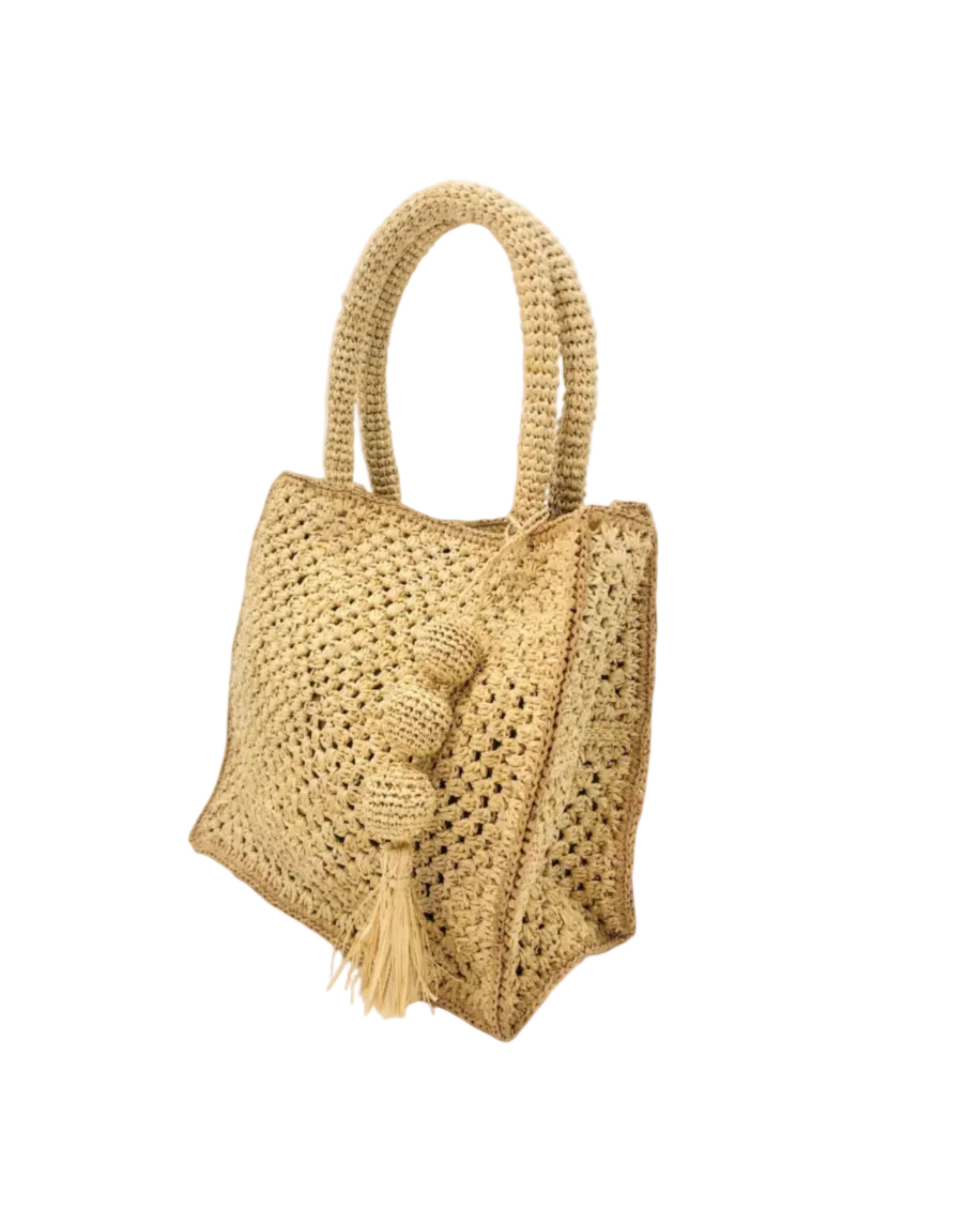 Side view of Kimba Crochet Handbag with Sphere Tassel Charm Embellishment handmade natural raffia palm fibers crochet into a granny square pattern with cappuccino/light brown detail edging - Shebobo