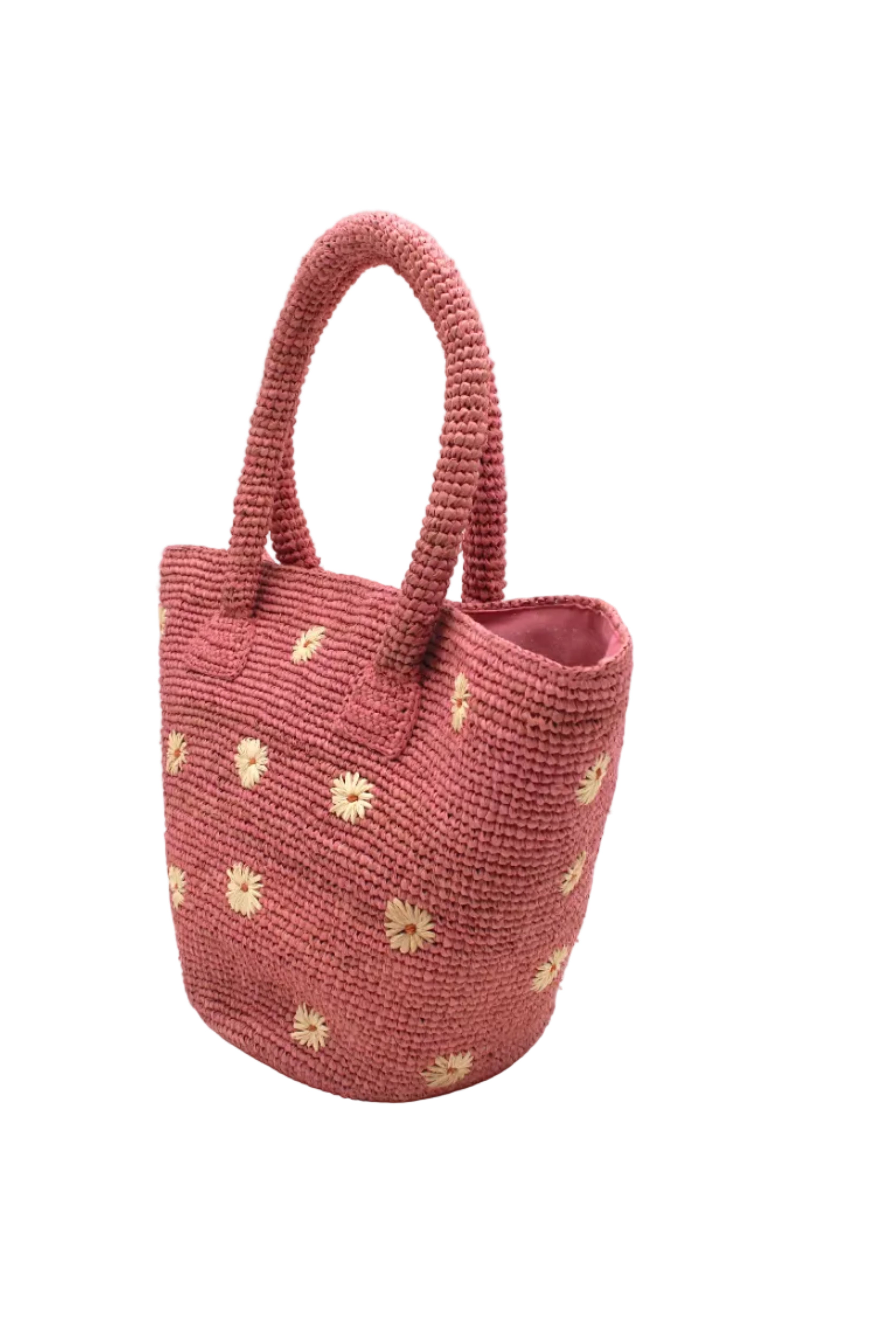 Side view Kirra Daisy Flowers Crochet Straw Basket Handbag handmade crochet raffia palm fiber in a solid hue of light pink with embroidered round natural straw color petals and blush pink/orange inner dot flower pattern purse with matching crochet handles beach bag purse tote - Shebobo